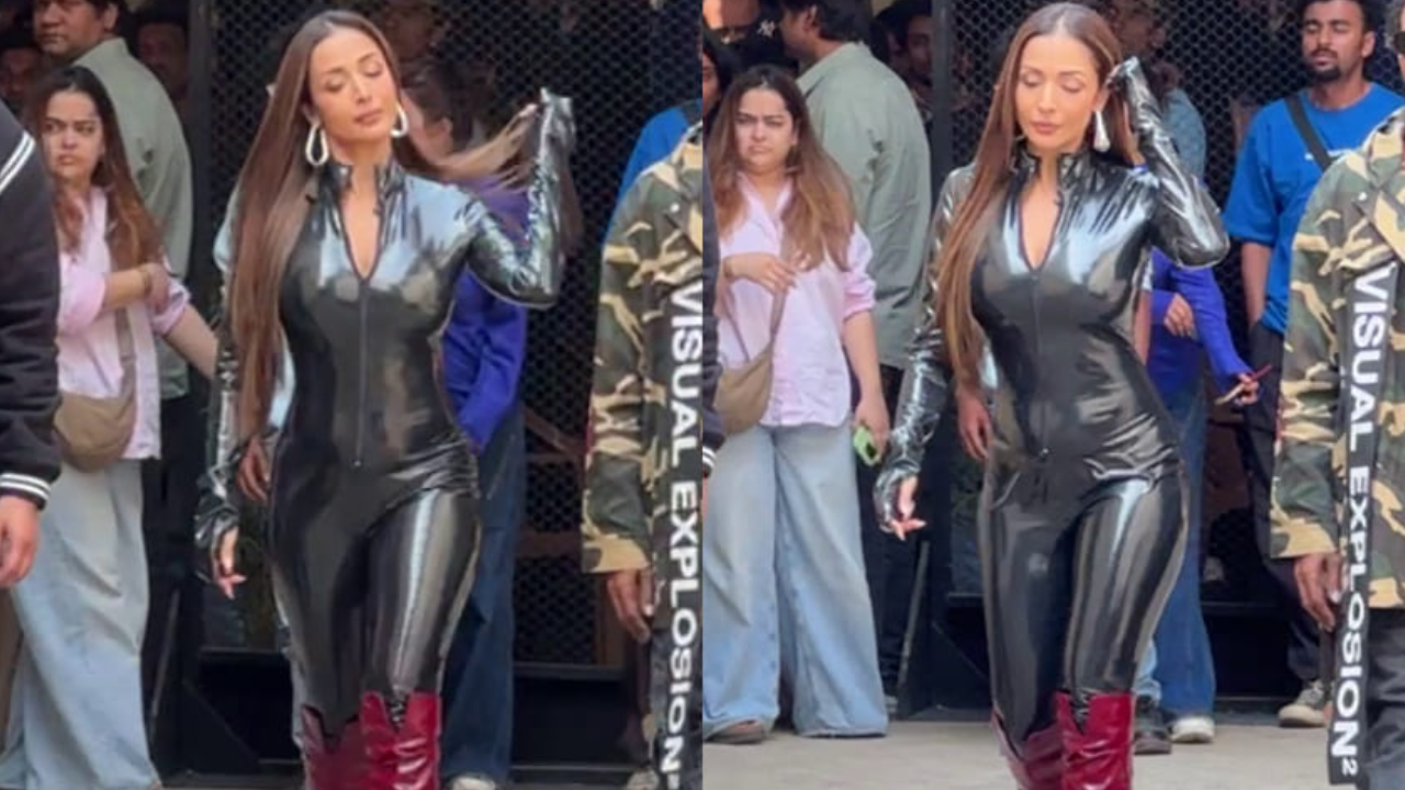 Malaika in latex bodysuit and cherry mocha boots