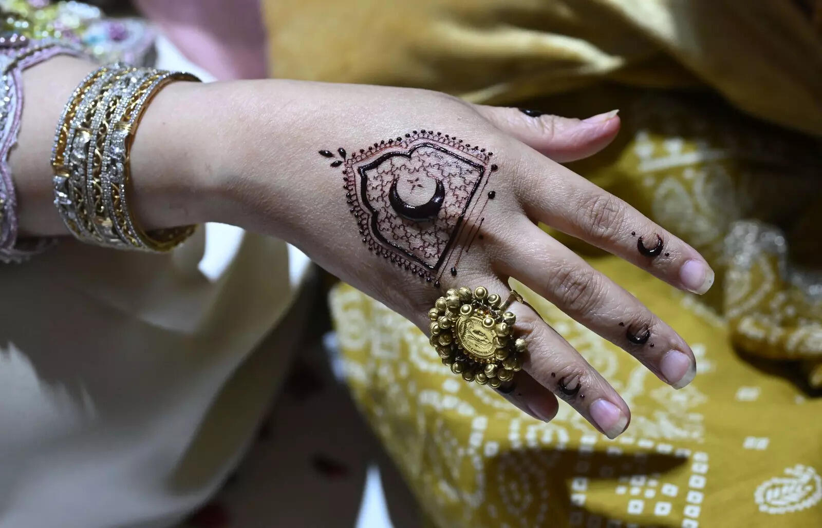 Guests adorned chand-raat inspired mehendi designs at the event
