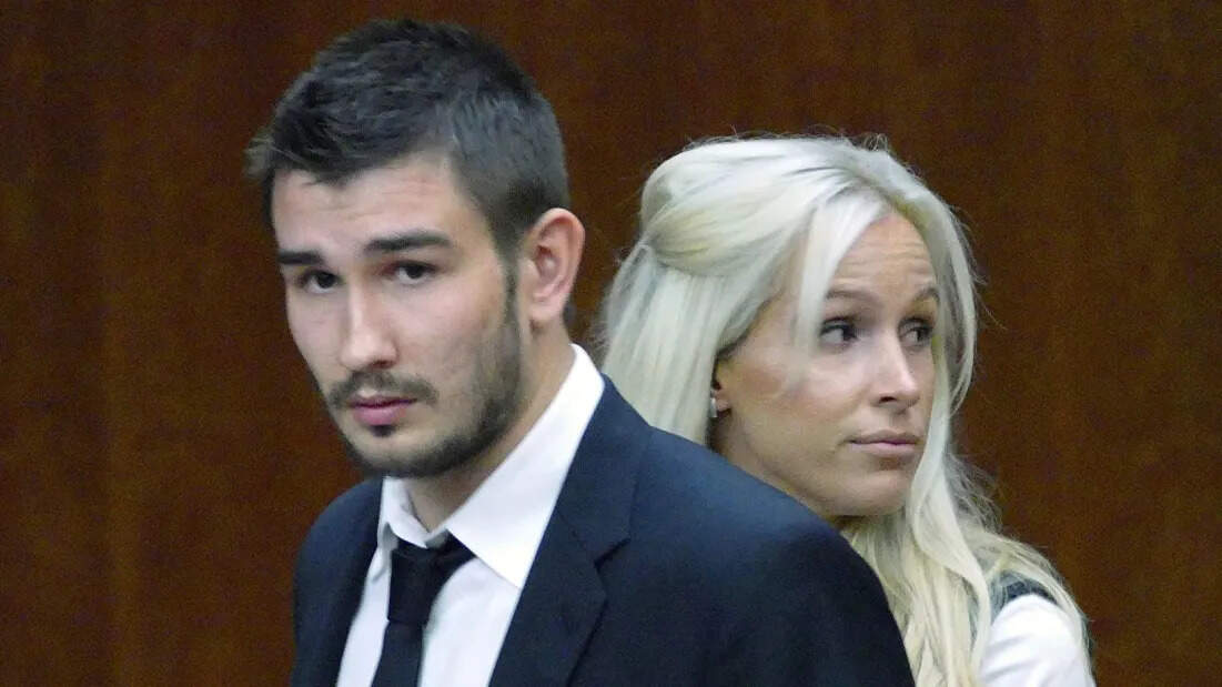 Voynov enters Superior Court with his wife, Marta Varlamova, in Torrance, Calif. on July 2, 2015.