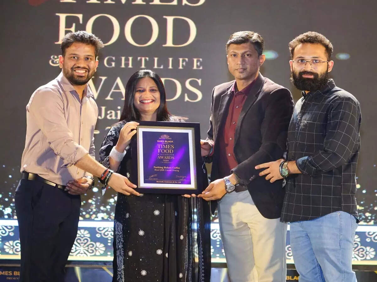 Best QSR Chain Casual Dining - Nothing Before Coffee (NBC) Sunita Meena felicitates the Shubham Bhandari, Sourish Roy, Shubham Sain