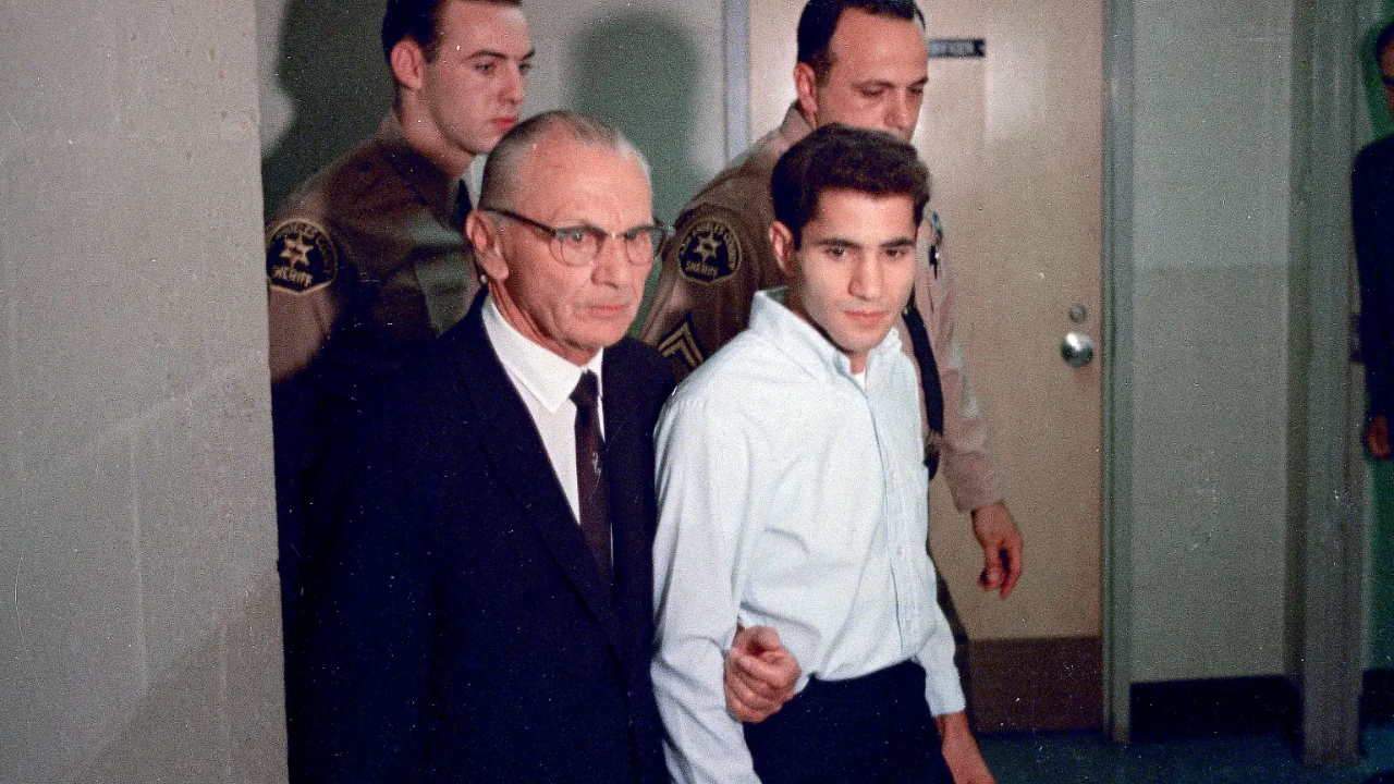 Sirhan Sirhan in custody with his attorney, June 1968 (AP image)