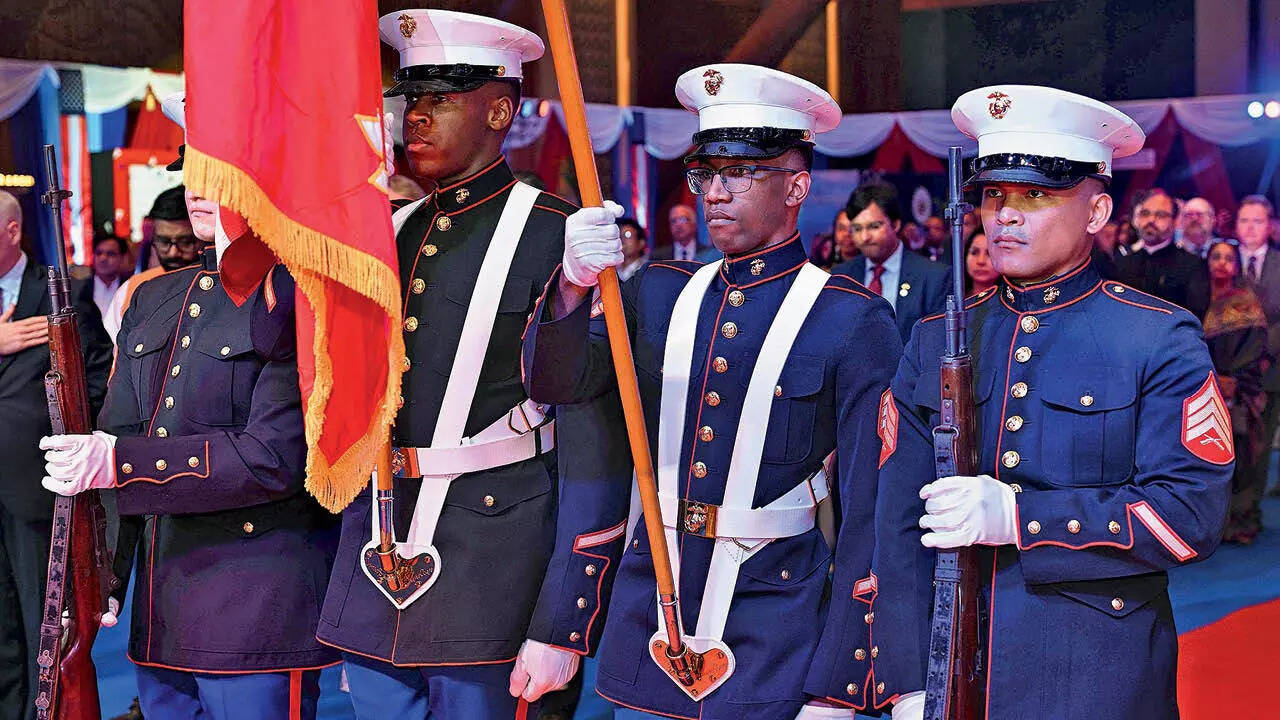The event began with the US Marines presenting the colours