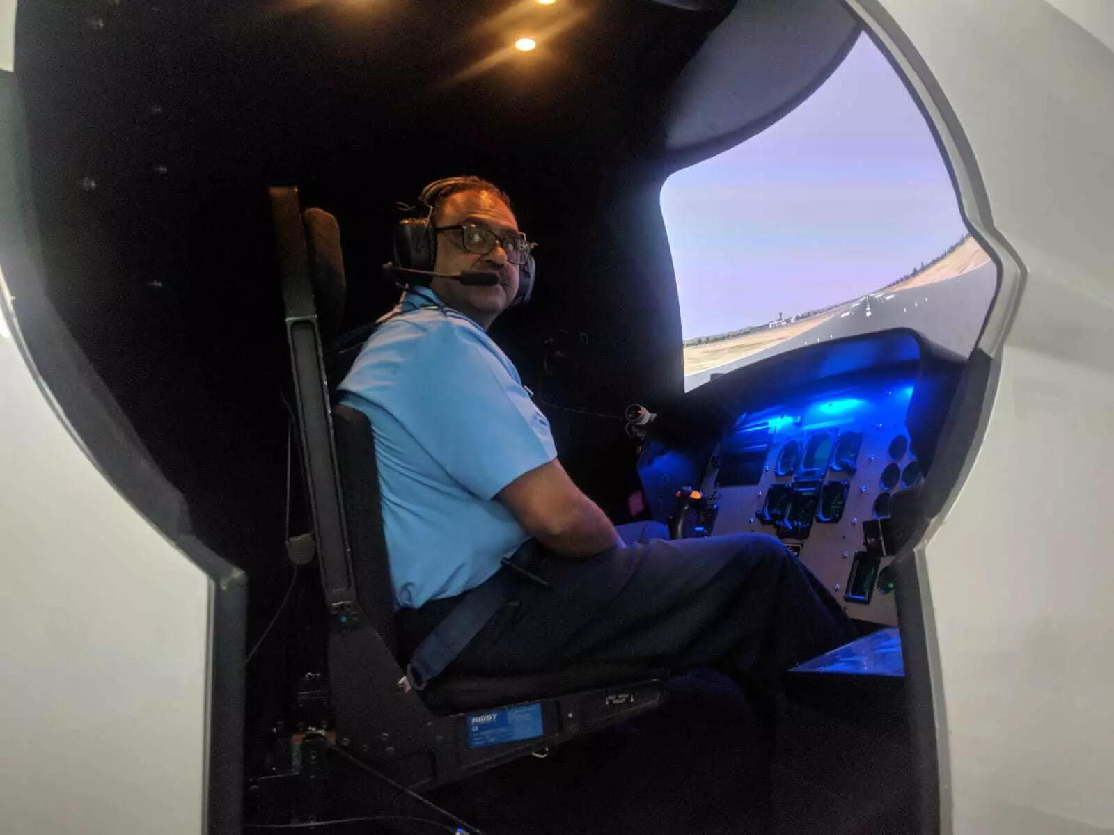 Image from TOI's exclusive visit to IAM ahead of the Gaganyaan astronaut selection. In the picture, AVM Anupam Agarwal (the commandant of IAM at the time) is in one of the simulators at IAM. | Credit: TOI
