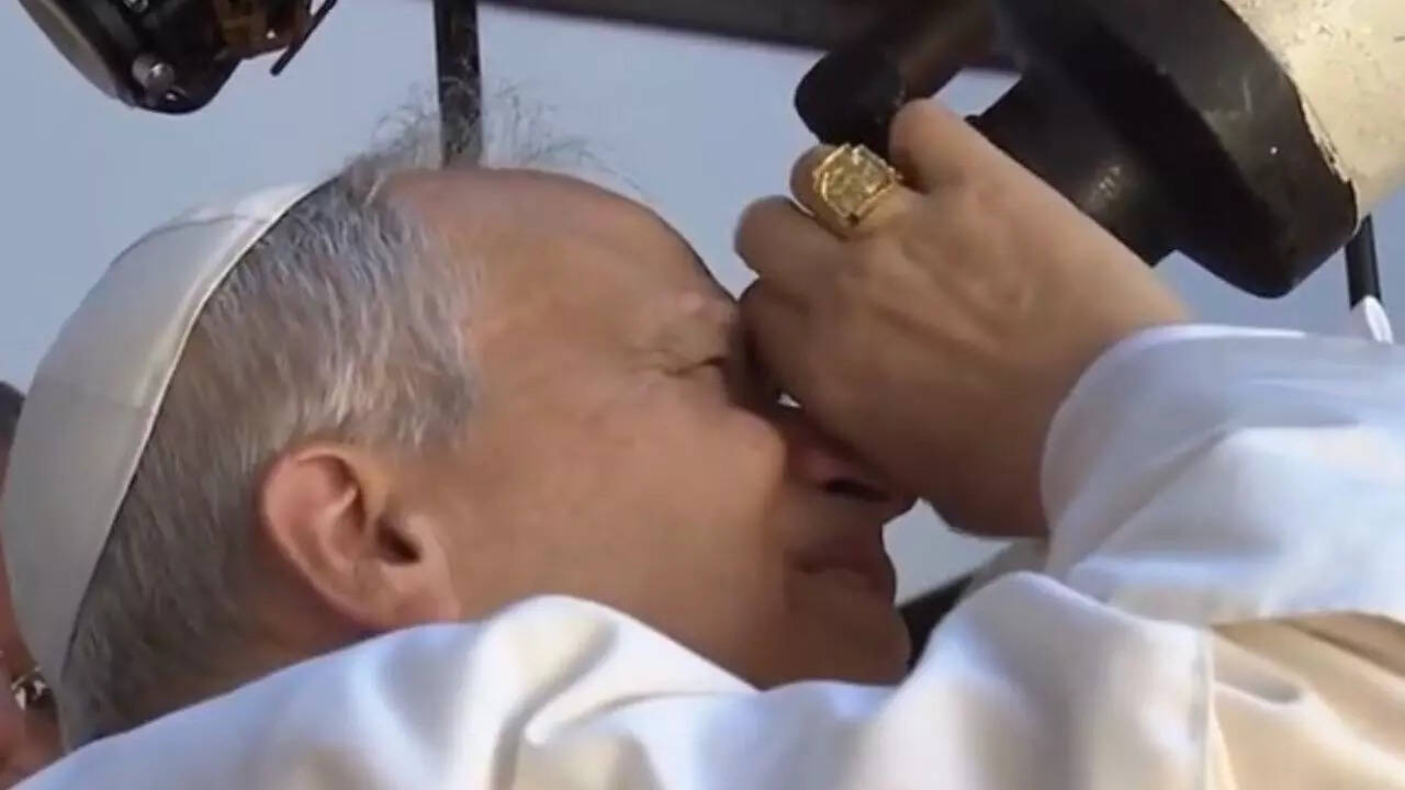 Images of the pope looking at the moon through the telescope have gone viral