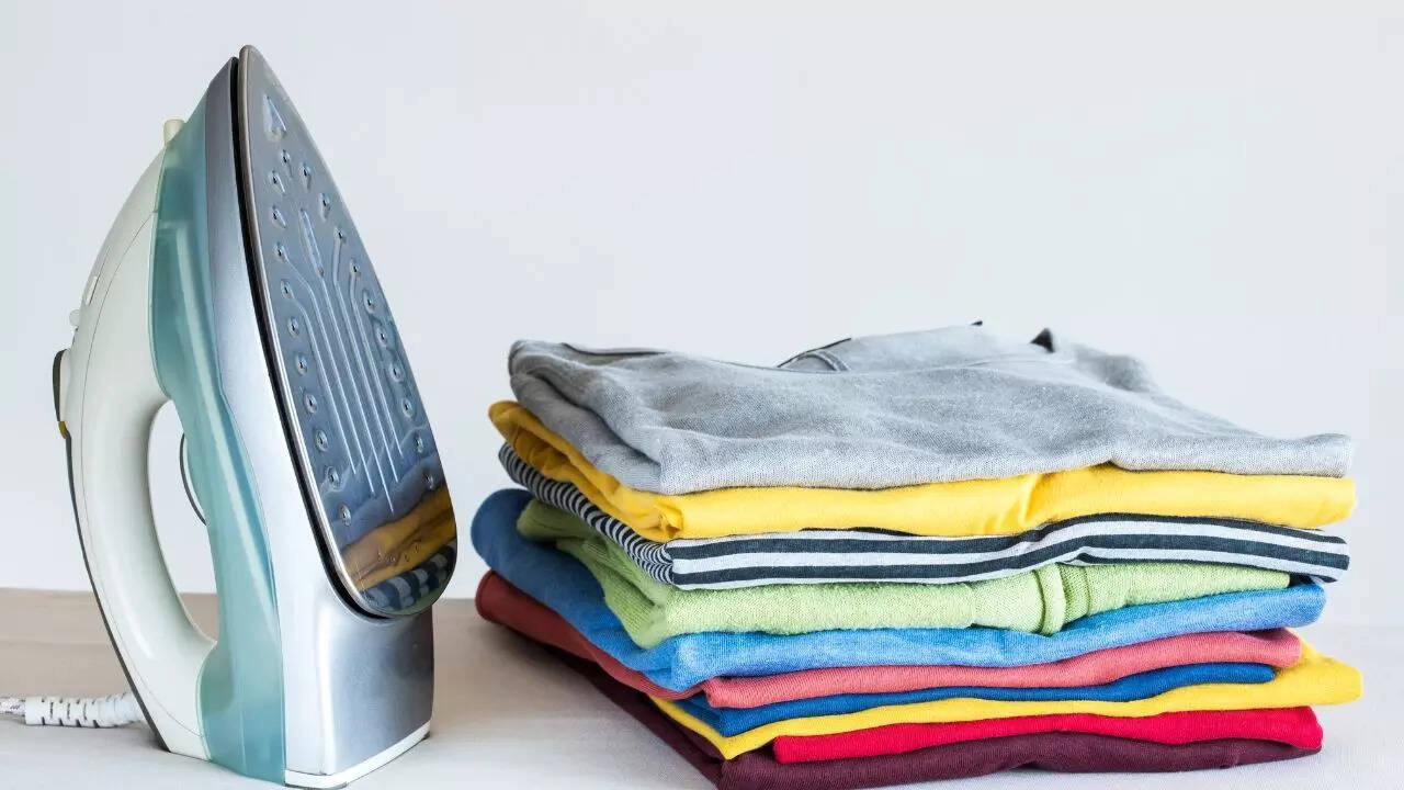 Iron damp clothes to finish drying and kill bacteria