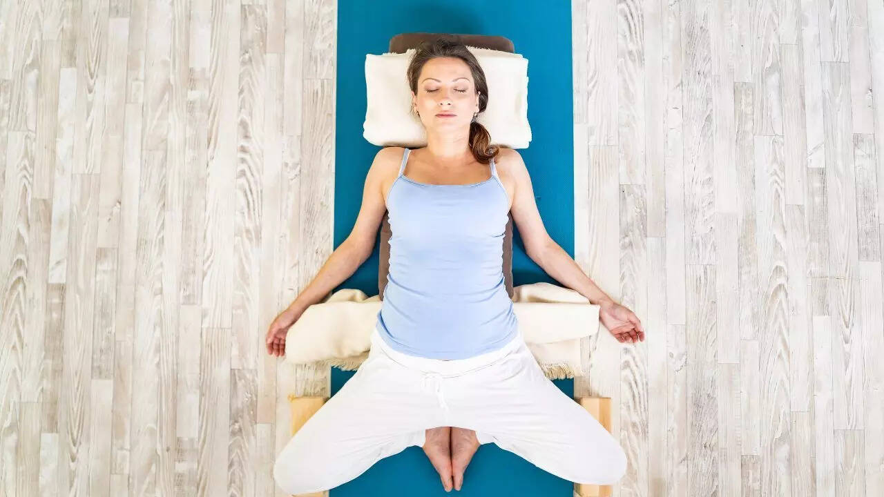 Supta Baddha Konasana (Reclining Bound Angle Pose)