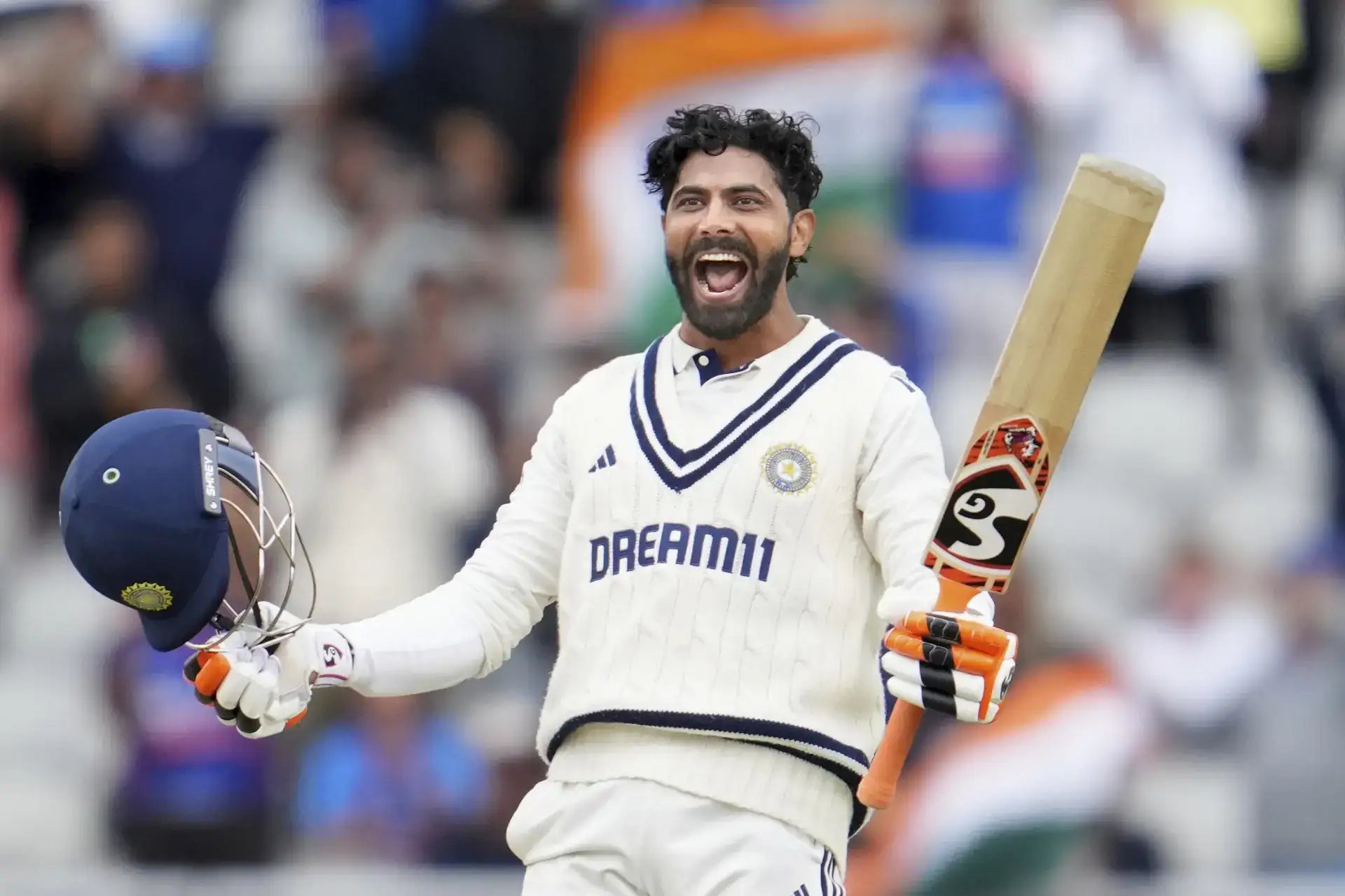 Ravindra Jadeja celebrates after scoring on the last day of the fourth Test match between England and India on the fourth Test match at Manchester. (AP) England india cricket