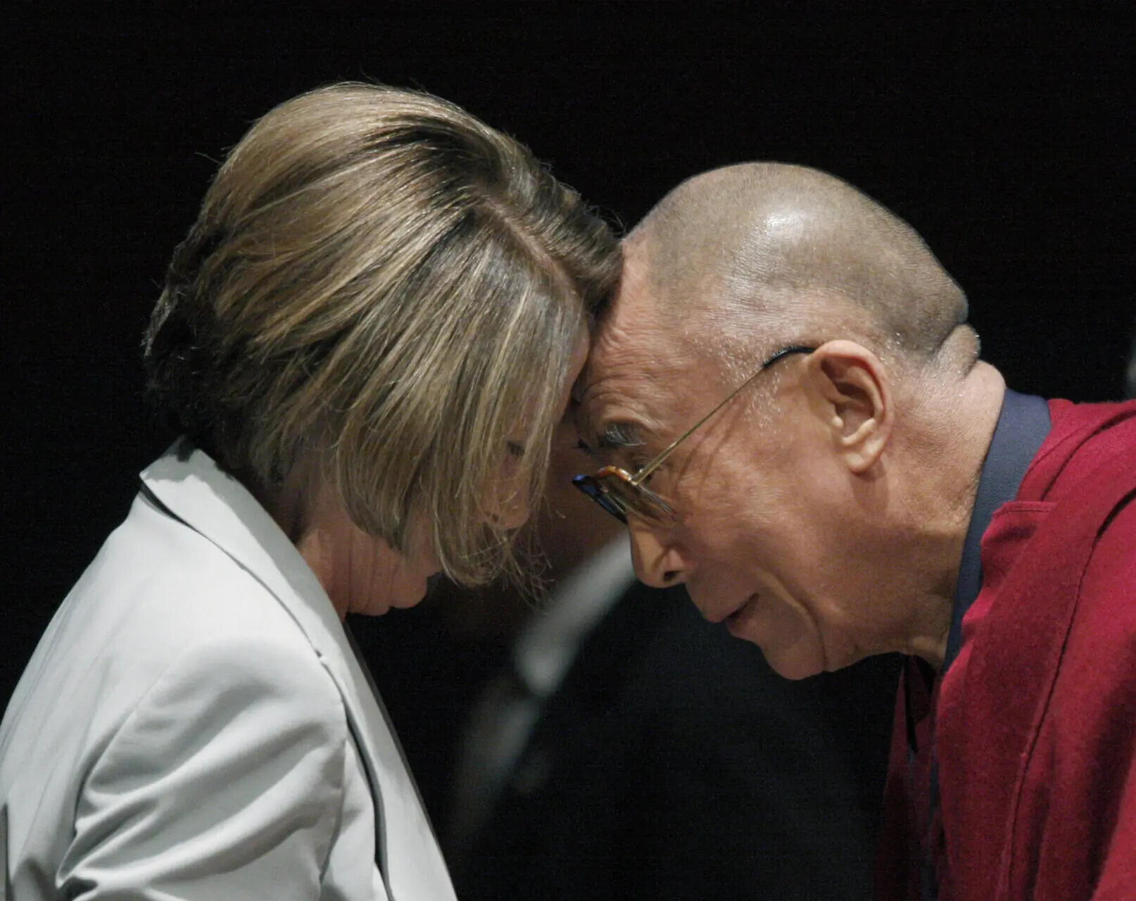 (AP Photo/Harry Hamburg, File) Nancy Pelosi with Dalai Lama