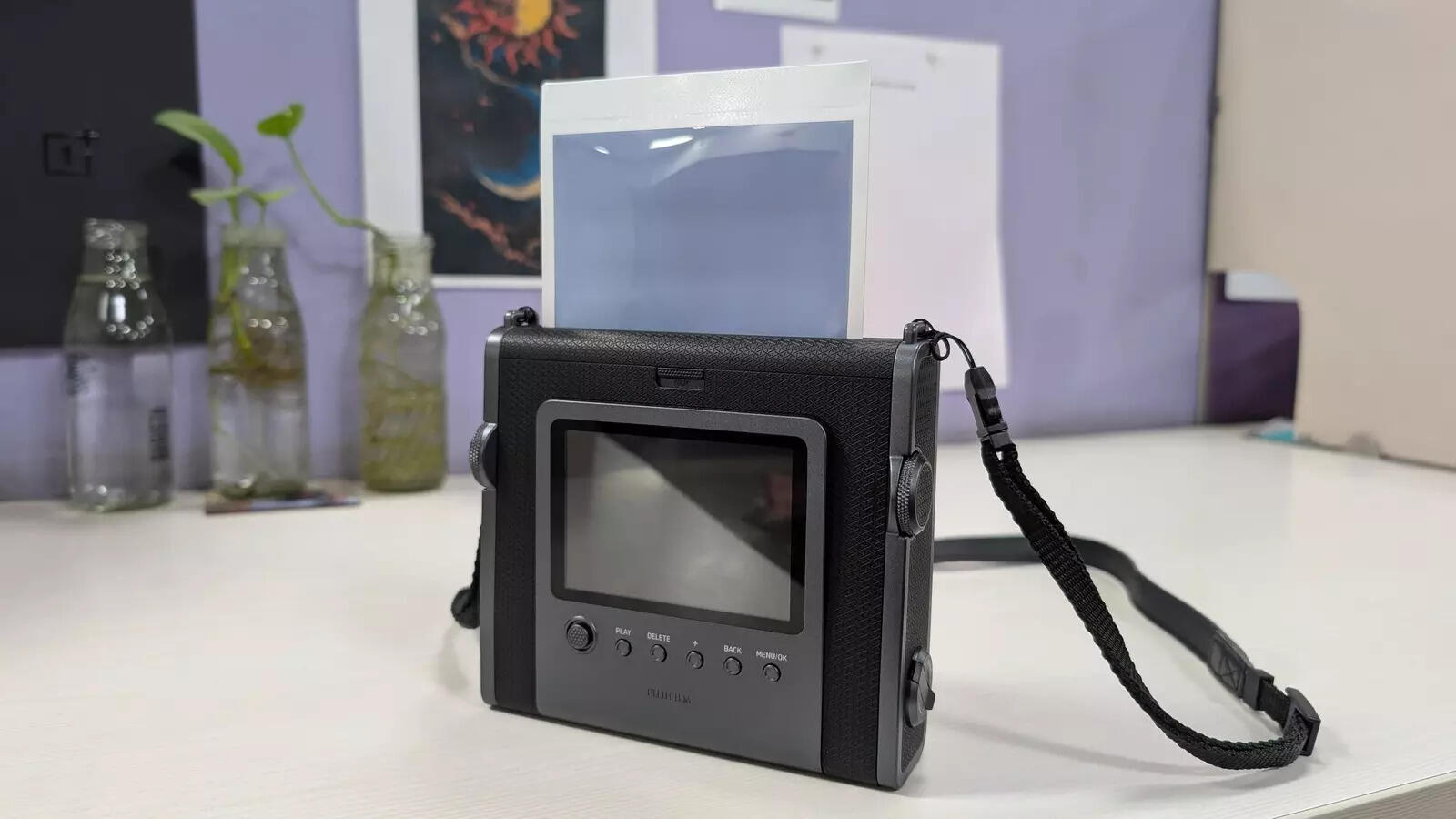 Instax Wide Evo is a little on the bulkier side but isn't uncomfortable to carry around