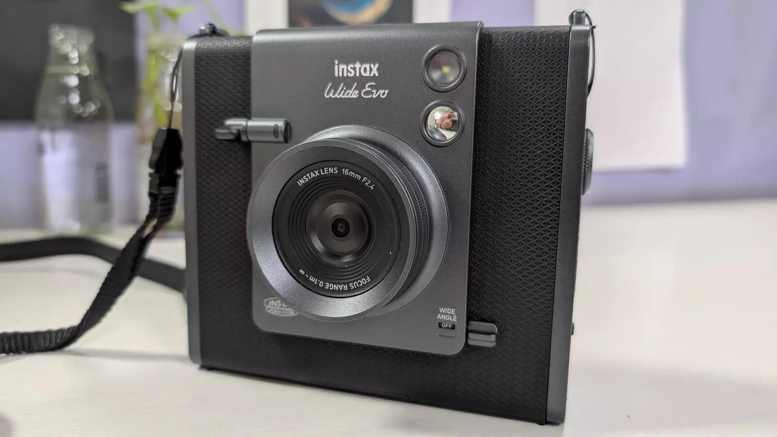 Shutter and wide angle button on the front