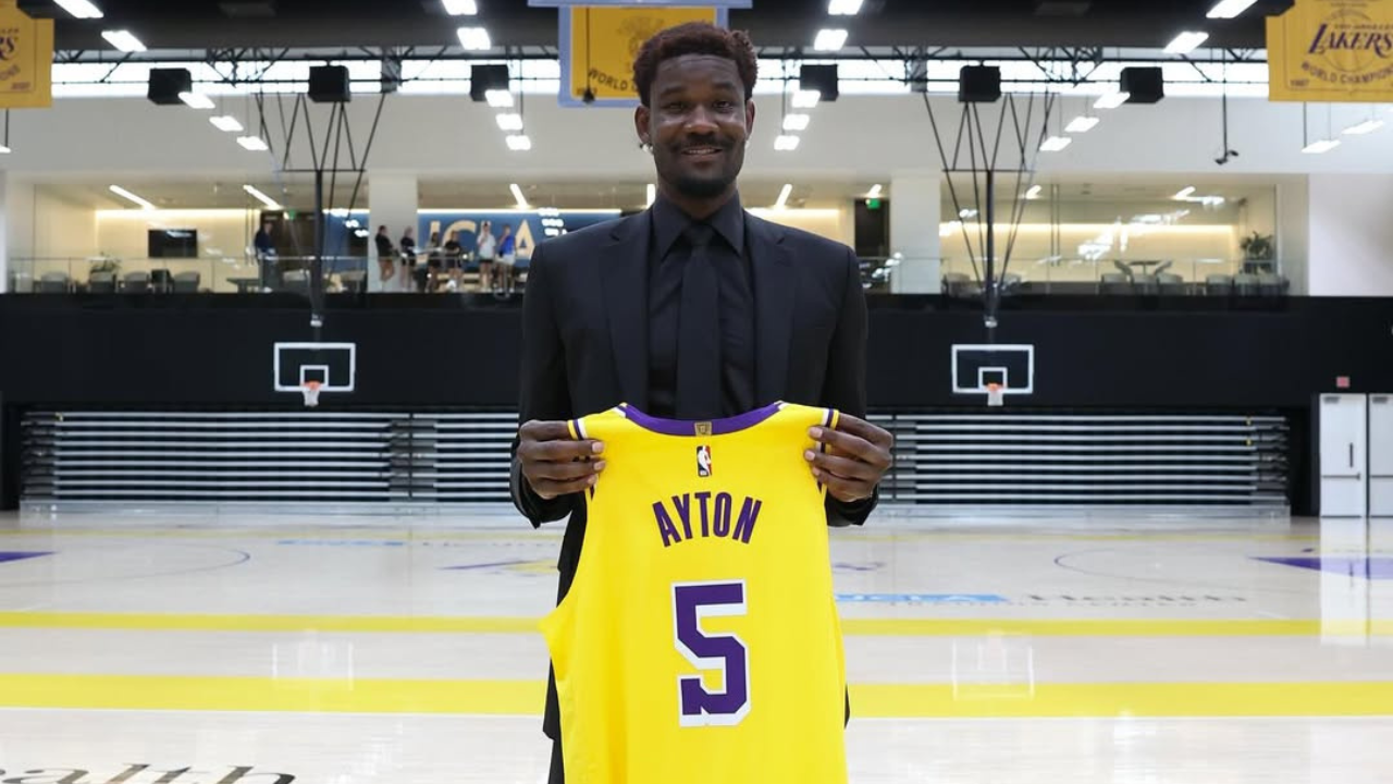 ​DeAndre Ayton holding the Los Angeles Lakers’ jersey