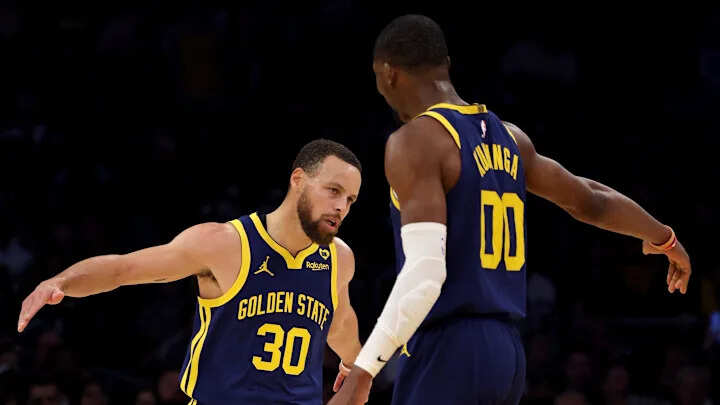Stephen Curry and Jonathan Kuminga