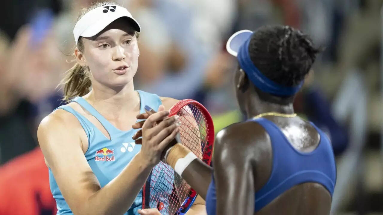 Elena Rybakina and Victoria Mboko at the net after their semi-final match in Montreal. (AP) Mboko Rybakina AP