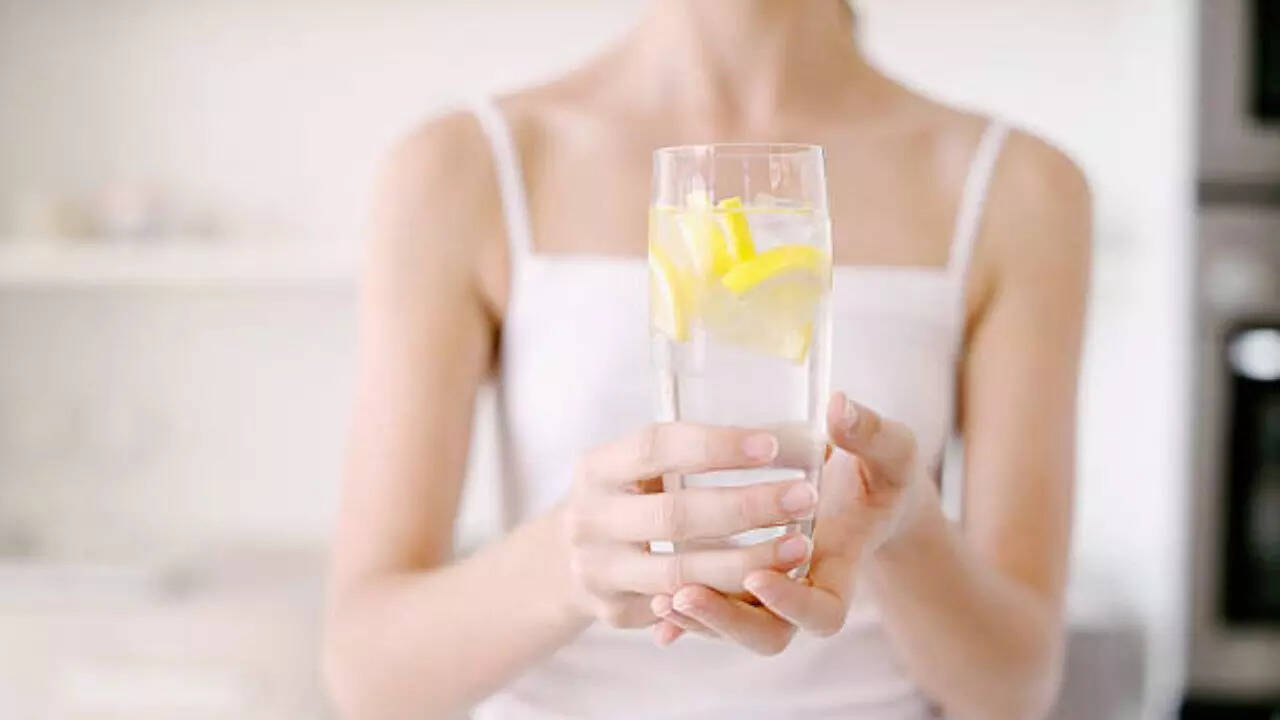 Begin the day with lemon or apple cider water