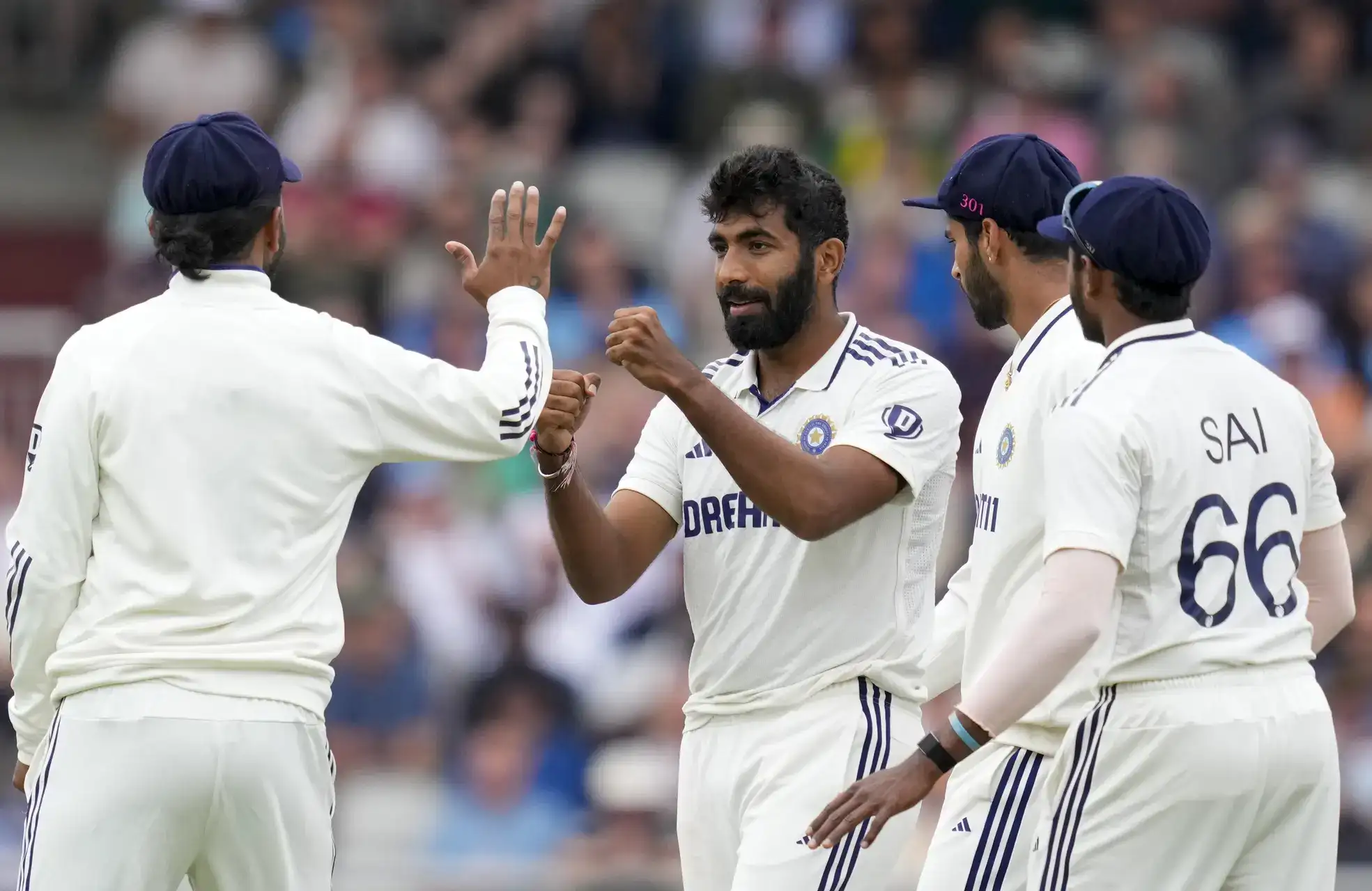 Manchester: India's Jasprit Bumrah celebrates with teammates after taking the wicket of England's Liam Dawson during the fourth day of the fourth Test match between India and England, at the Old Trafford cricket ground, in Manchester, England. (PTI Photo/R Senthilkumar)(PTI07_26_2025_000207B) IND vs ENG: 4th Test Day 4