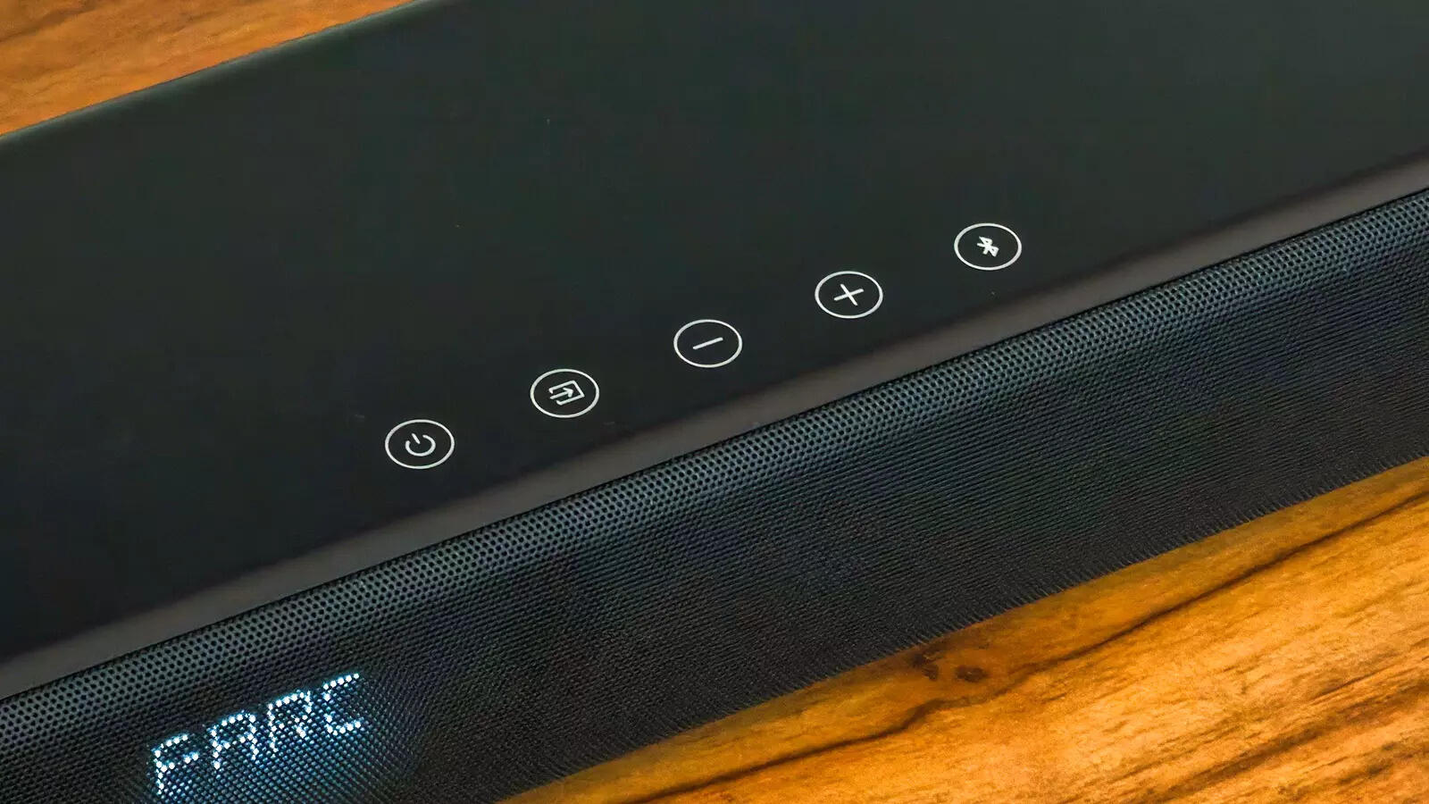 There are a few touch capacitive buttons on the top, that's it. No app, nothing.