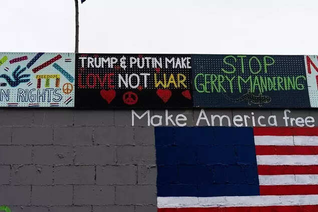 A wall decorated with political and social messages is seen in Anchorage, Alaska, Thursday, August 14, 2025, ahead of a meeting between President Donald Trump and Russian President Vladimir Putin. (AP)