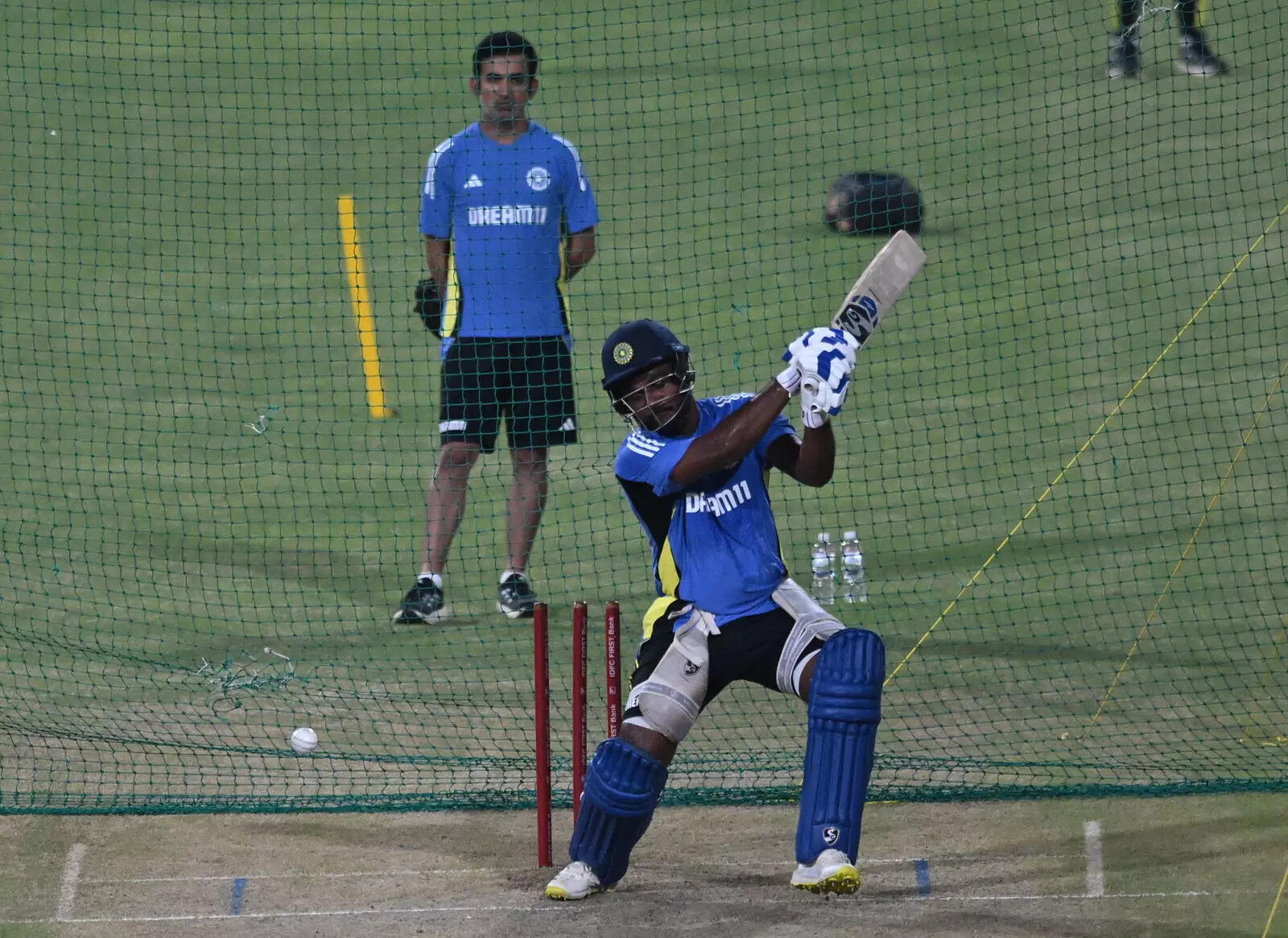 Coach Gautam Gambhir watch as Sanju Samson play a shot during Practice session of Team India for T20 International Cricket match against Team Bangladesh which will be played on 06 oct24, at Shrimant Madhavrao Scindia Cricket Stadium in Gwalior, Madhya Pradesh on Saturday. Sanju Samson