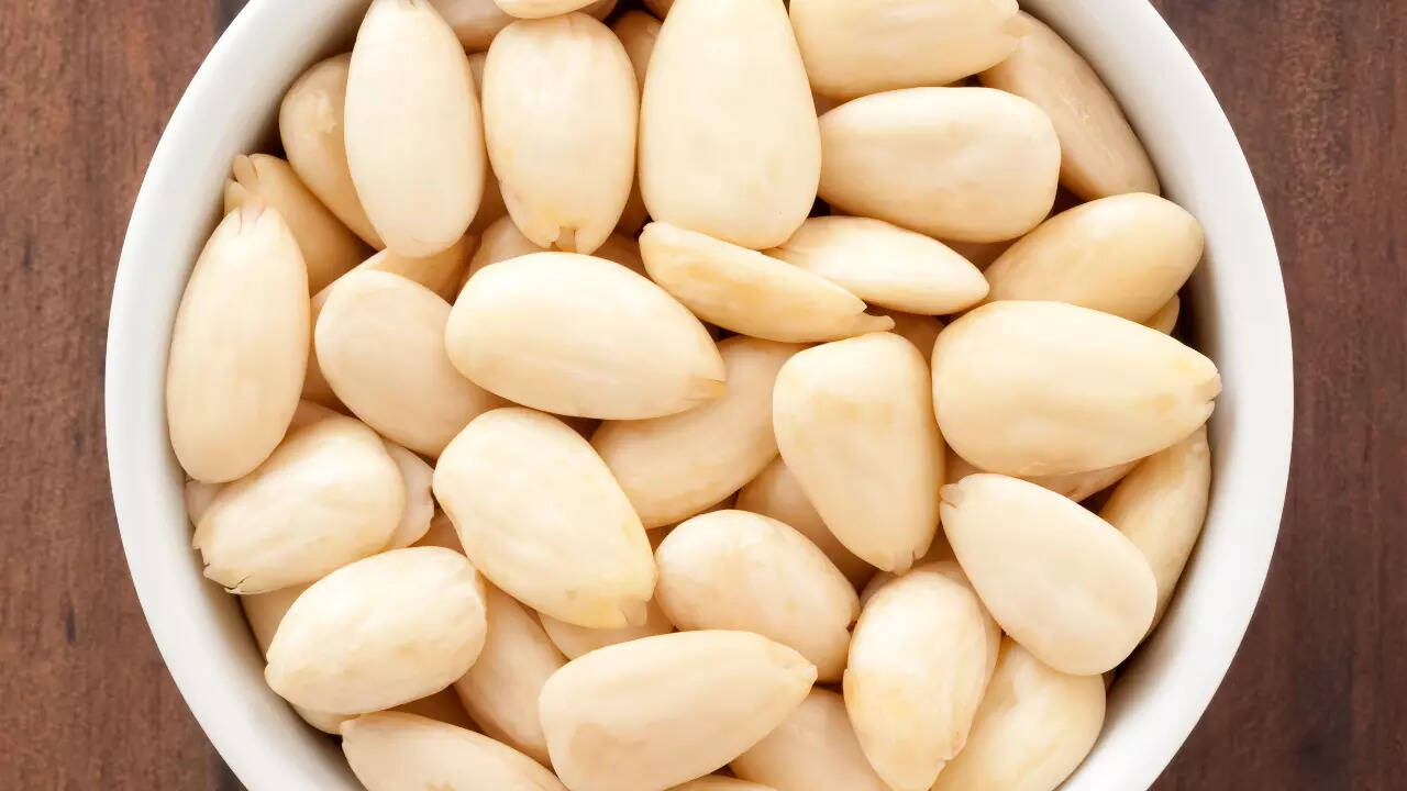 It is said that soaking the almonds and removing the skin soften the texture, making them easier to chew and digest. Also, soaking may help reduce anti-nutrients like phytic acid, improving the bioavailability of minerals. Soaked and peeled almonds are easy on the gut, which aids digestion. Benefits of almonds without peel