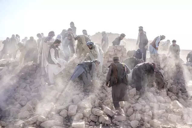 fghan volunteers clean up rubble after an earthquake in Zenda Jan district in Herat province, western Afghanistan, Wednesday, October 11, 2023. (AP)