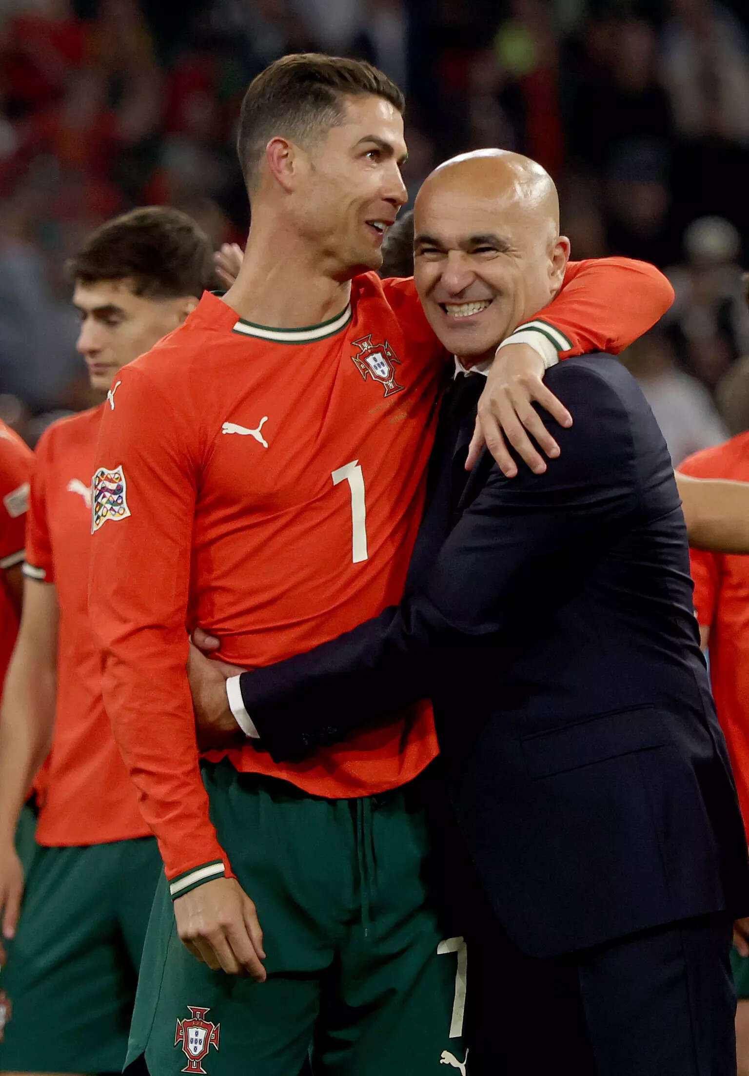Portugal's Cristiano Ronaldo and Coach Roberto Martinez (Photo by Lars Baron/Getty Image) Cristiano Ronaldo and Roberto Martinez