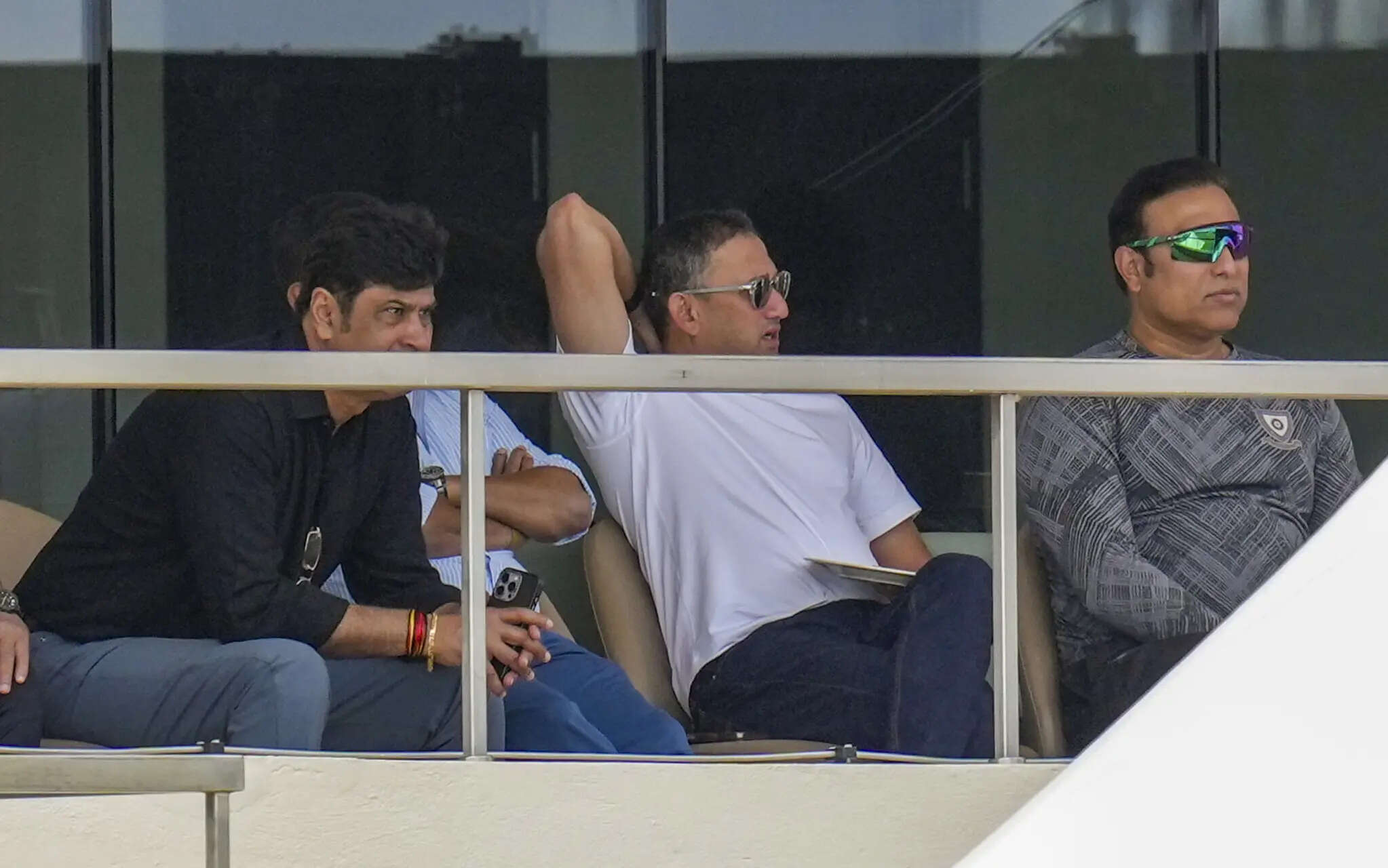 Bengaluru: BCCI Chief Selector Ajit Agarkar, center, former cricketer VVS Laxman, right, and others on day two of the Duleep Trophy 2025 first semifinal cricket match between South Zone and North Zone, at BCCI Centre of Excellence ground, in Bengaluru, Karnataka. (PTI Photo/Shailendra Bhojak) (PTI09_05_2025_000109B) Duleep Trophy: South Zone vs North Zone-Day 2