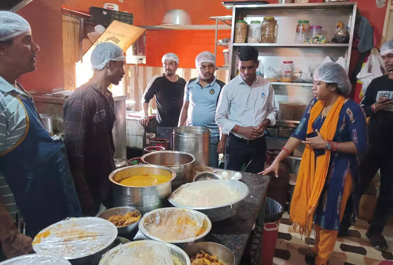 BMC officials check food quality at a shop in Bhubaneswar on Tuesday