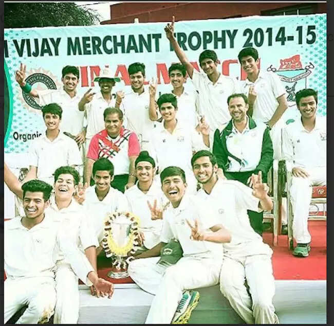 A young Shubman Gill and Abhishek Sharma sitting next to coach Arun Bedi after Punjab won the 2014-15 Vijay Merchant Trophy (Special arrangement)