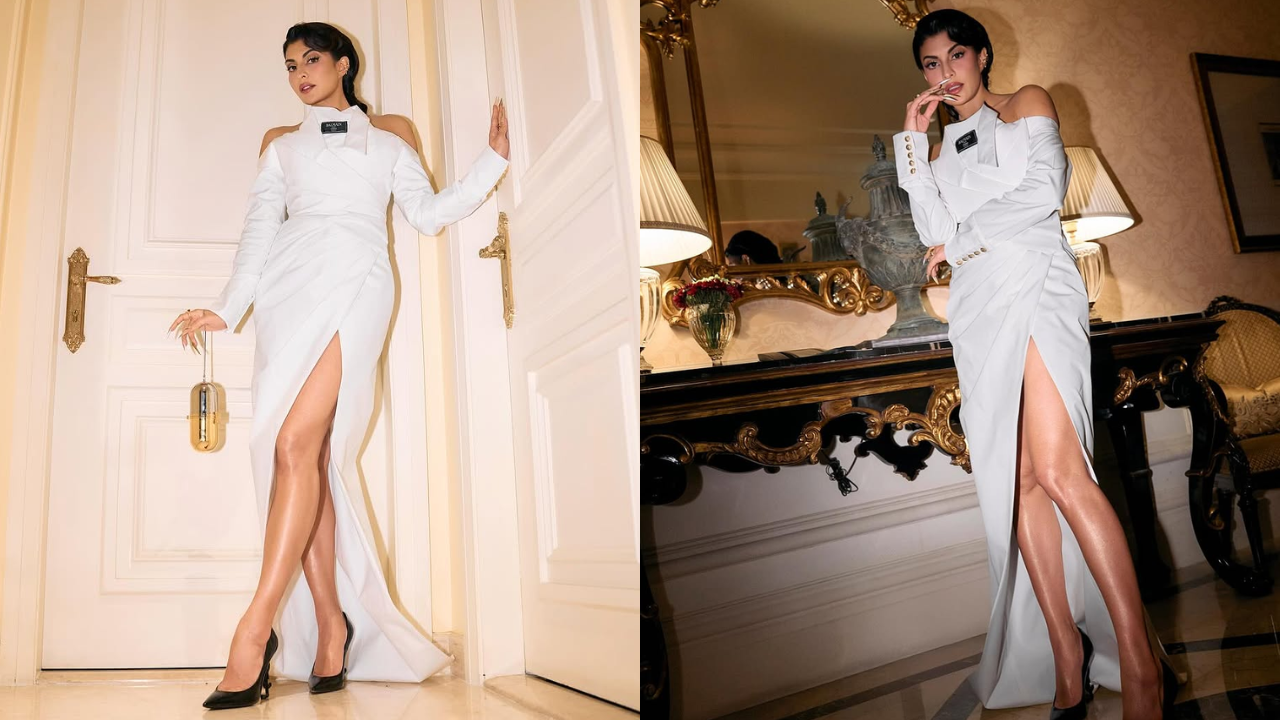 Jacqueline turns heads in a crisp white Balmain gown