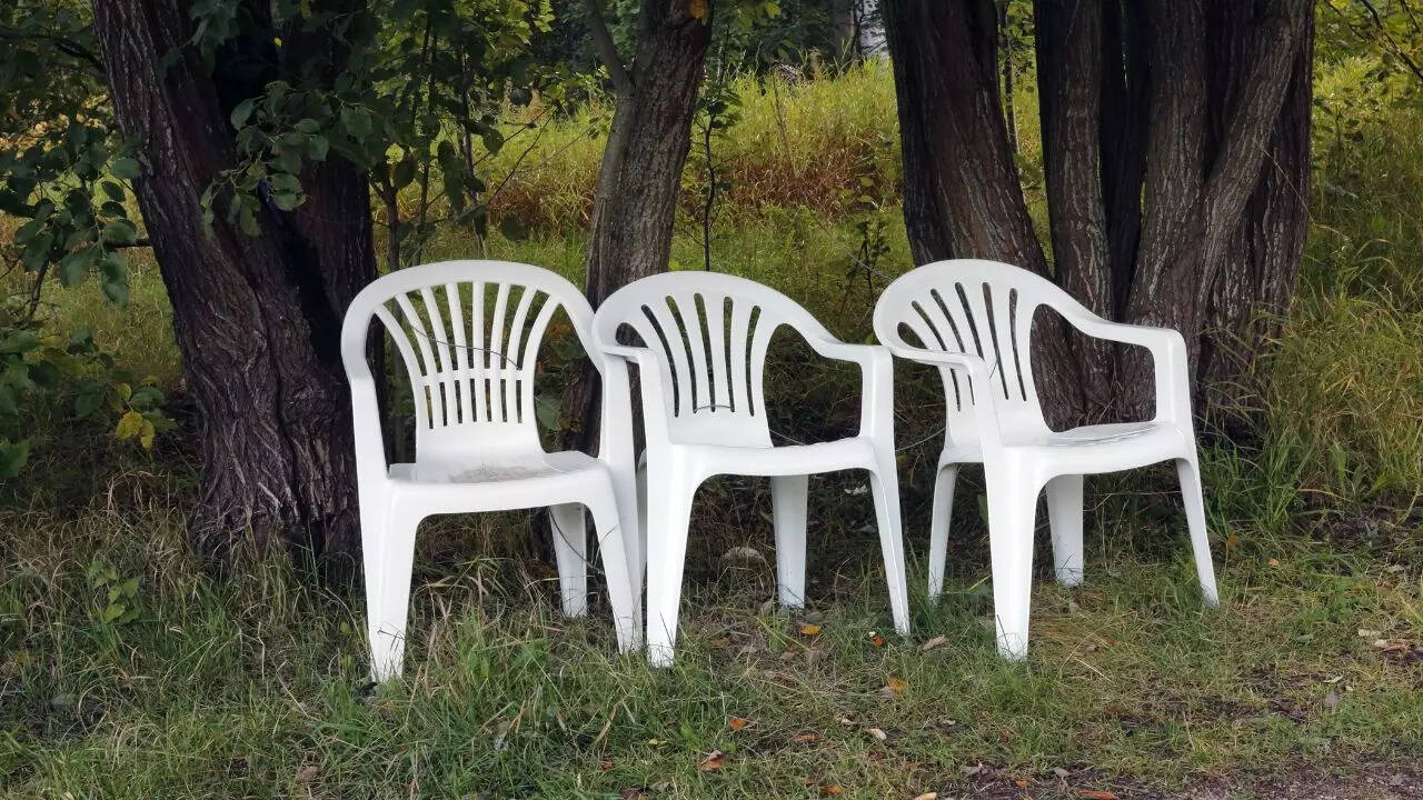 Plastic chairs with a hole at the back make cleaning easier
