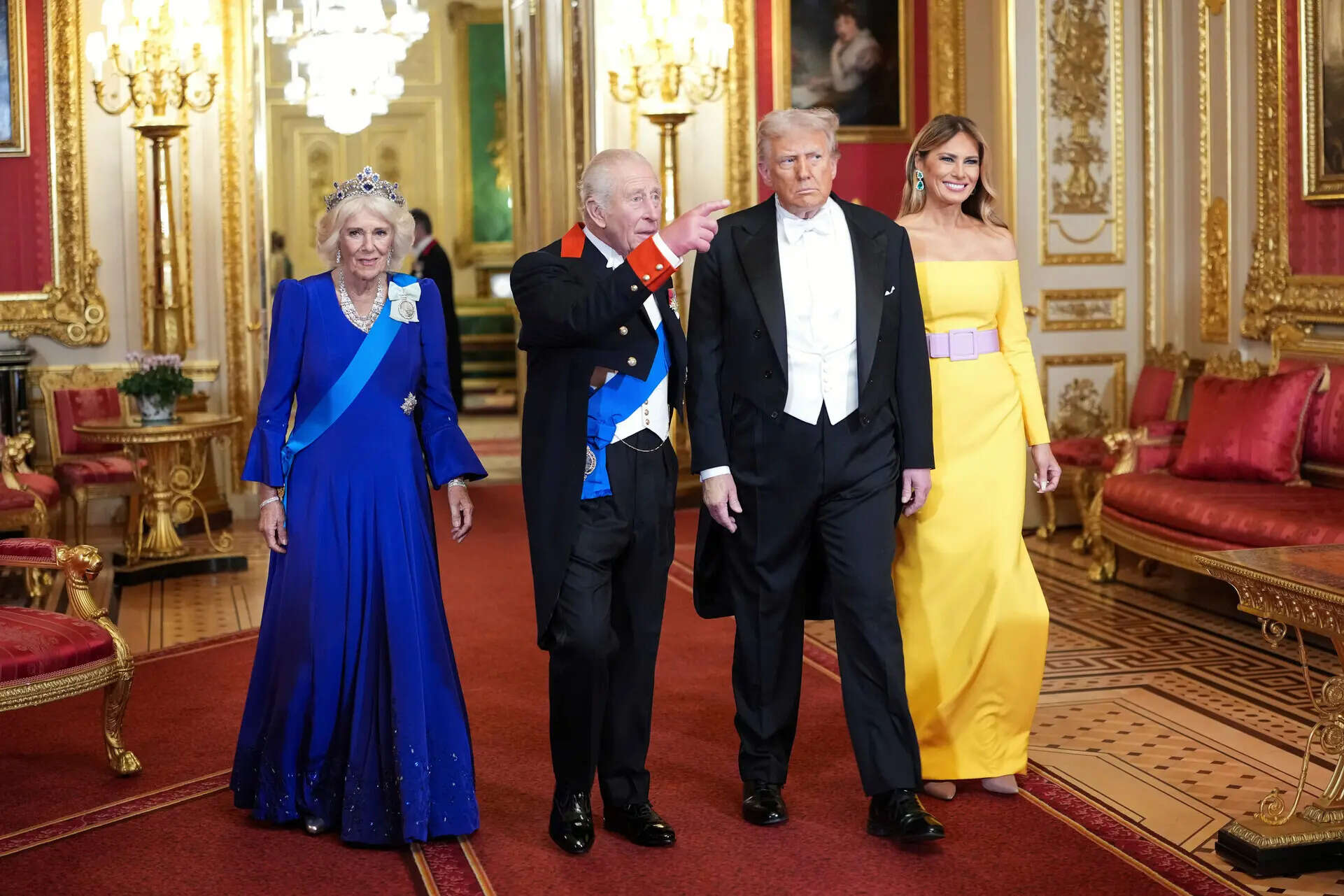 U.S. President Donald Trump and First Lady Melania Trump, right, arrive with Britain's King Charles and Britain's Queen Camilla, for the official state banquet at the Windsor Castle, in Windsor, England, Wednesday, Sept. 17, 2025. (Doug Mills/The New York Times via AP, Pool) Photos show President Donald Trump during his second state visit to Britain