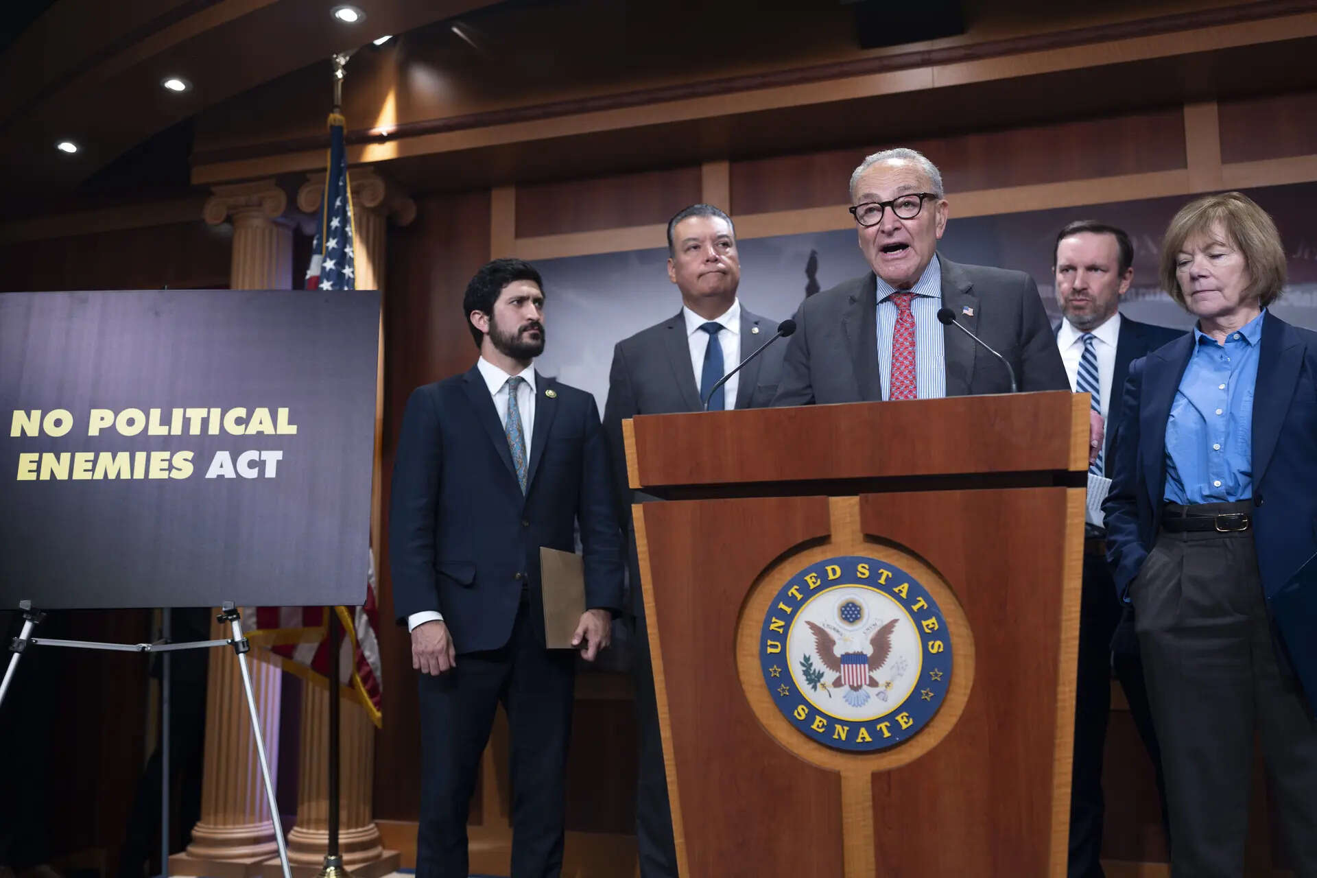 Senate Minority Leader Chuck Schumer, D-N.Y., center, is joined from left by Rep. Greg Casar, D-Texas, Sen. Alex Padilla, D-Calif., Sen. Chris Murphy, D-Conn., and Sen. Tina Smith, D-Minn., as they talk about the First Amendment and free speech after late night talk show comedian Jimmy Kimmel was suspended by ABC indefinitely amid a controversy over his recent comments about Charlie Kirk's suspected killer, during a news conference at the Capitol in Washington, Thursday, Sept. 18, 2025. (AP Photo/J. Scott Applewhite) Congress Trump Jimmy Kimmel