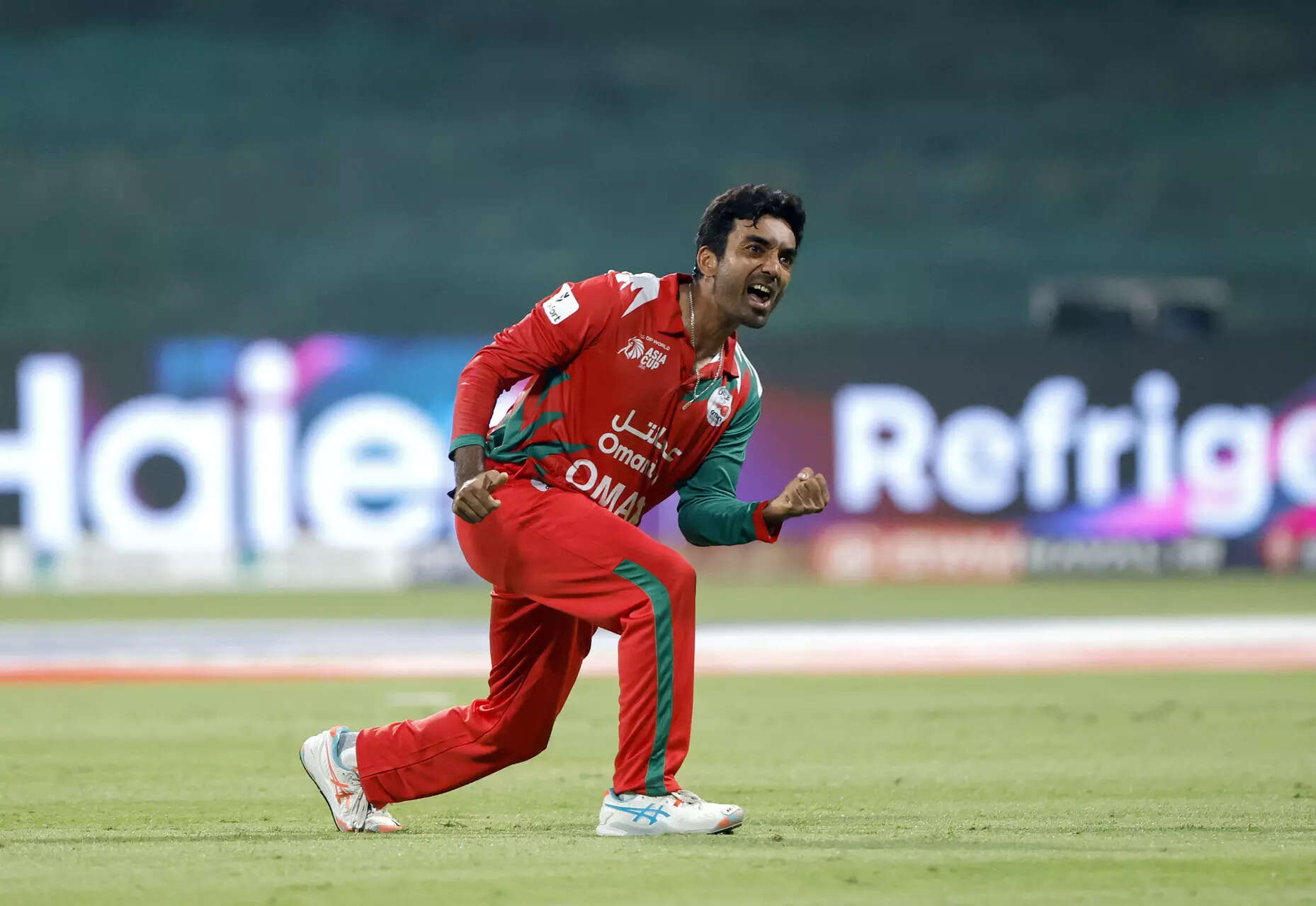 Oman's Aamir Kaleem celebrates the wicket of India's Shivam Dube. (ANI Photo) Aamir Kaleem