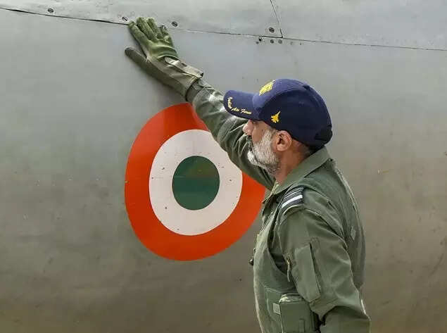 Chief of the Air Staff (CAS) Air Chief Marshal Amar Preet Singh inspects a MiG-21 aircraft before making a sortie, at the Nal Air Force Station, in Bikaner district, Rajasthan. (PTI Photo)
