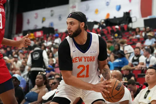 Anton Watson #21 of the New York Knicks handles the ball during the game against the Washington Wizards during the 2025 NBA Summer League game