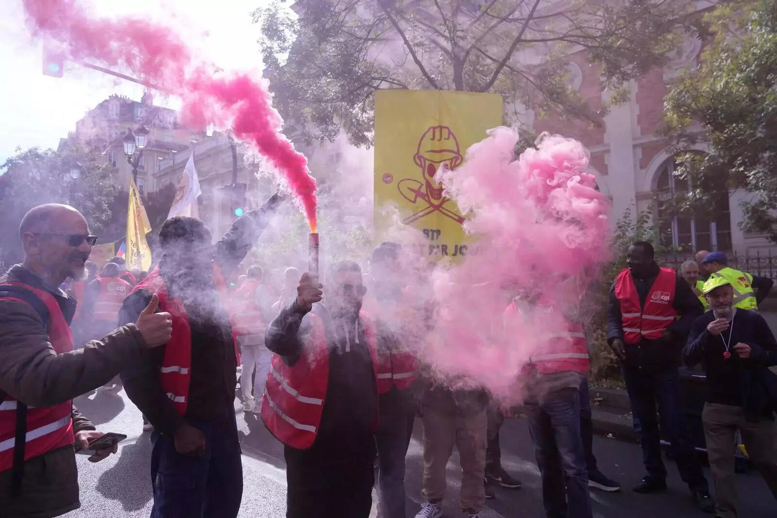 Unionists use flares during a new round of strikes and protests against the caretaker government (AP image) Unionists use flares during a new round of strikes and protests against the caretaker government (AP image)