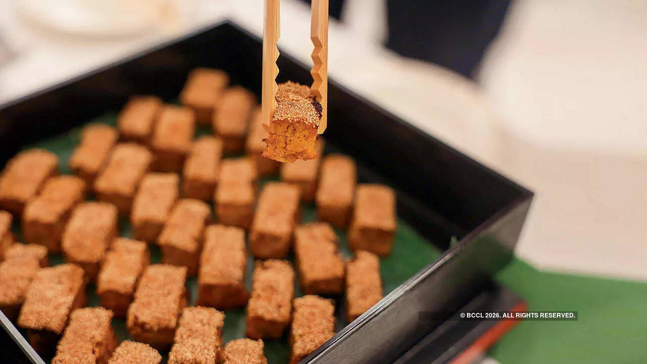 Kaki no Tane Karinto, a snack made from flour, yeast, and brown sugar, then deep-fried Kaki no Tane Karinto, a snack made from flour, yeast, and brown sugar, then deep-fried