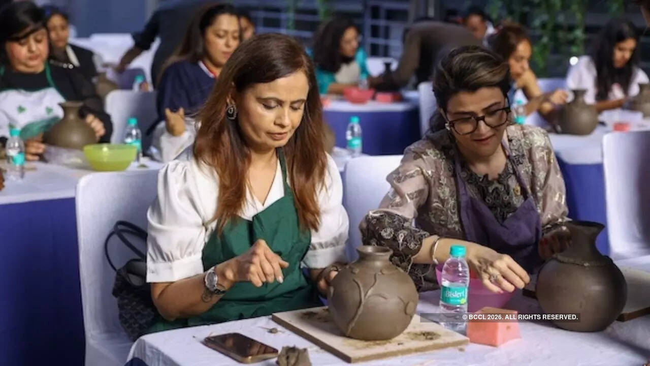 Women learning the art at the pottery workshop Women learning the art at the pottery workshop