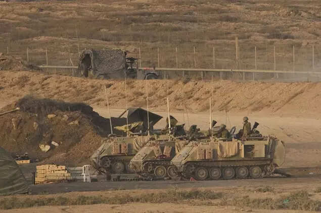 Israeli soldiers take position along the Gaza Strip border in southern Israel, Sunday, October 5, 2025. (AP)