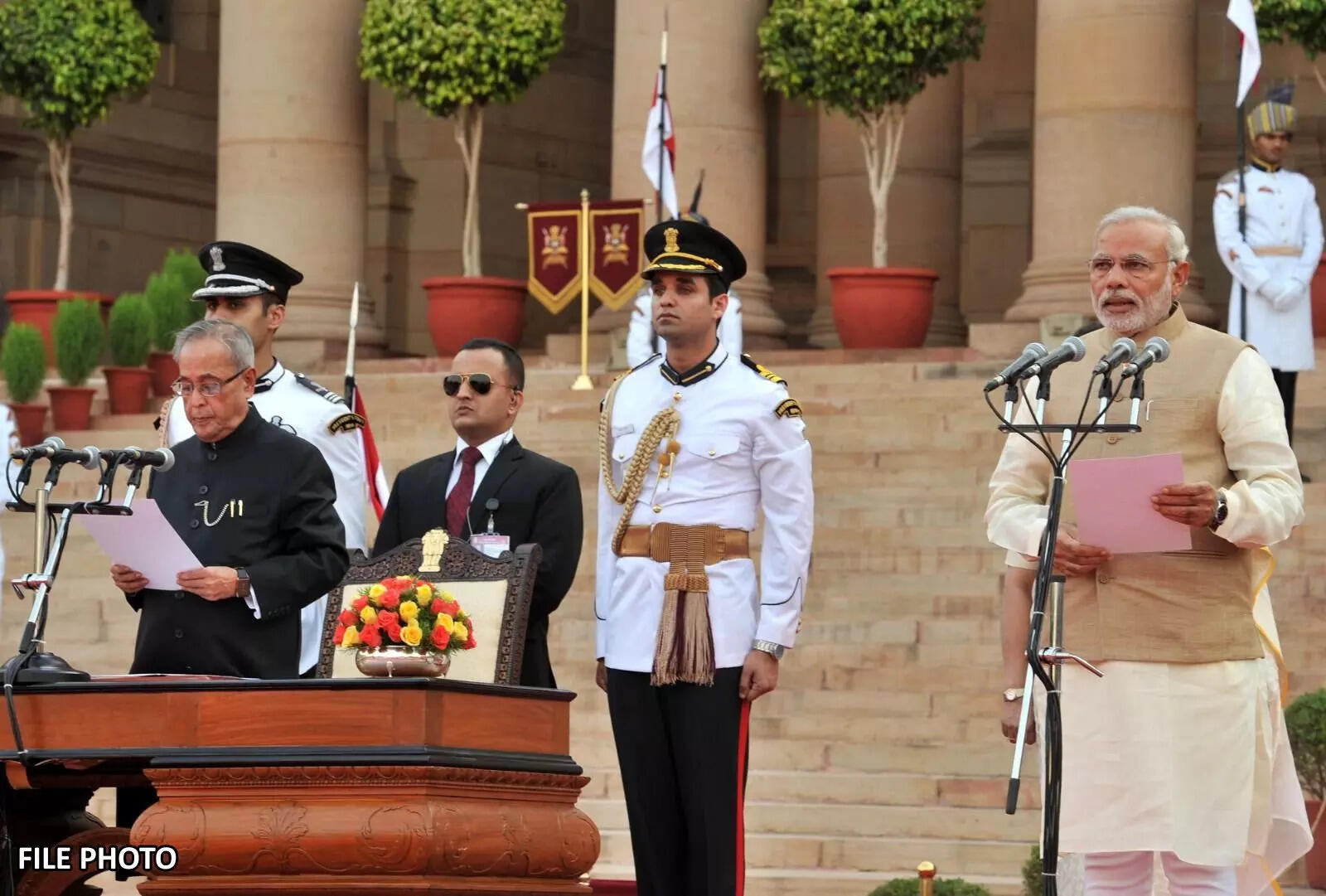 PM Modi taking oath in 2014 as the PM