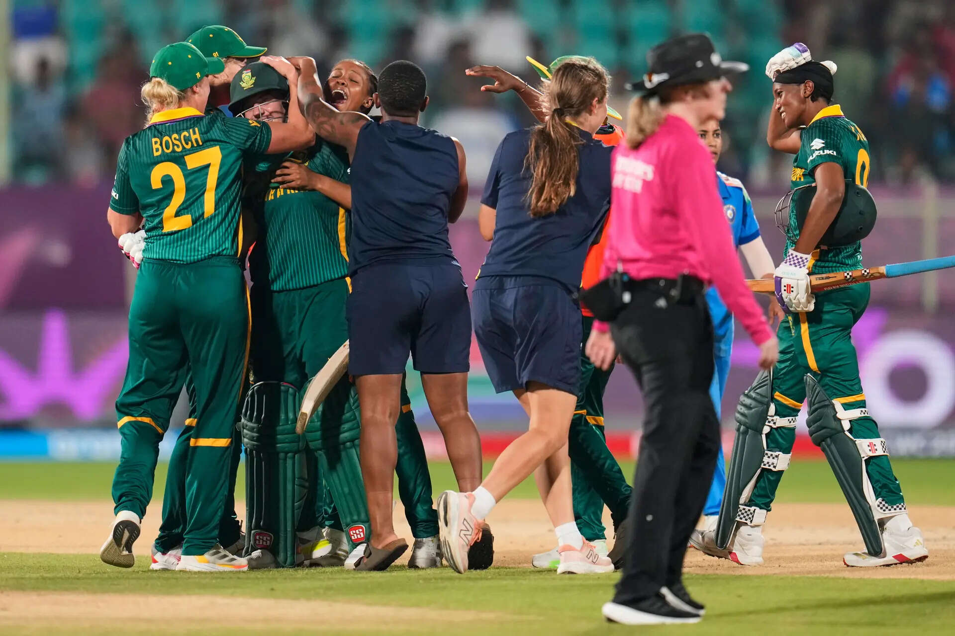 South Africa's Nadine de Klerk, second left, celebrates with teammates after hitting a six to win the ICC Women's Cricket World Cup match against India at ACA-VDCA Cricket Stadium in Visakhapatnam, India, Thursday, Oct. 9, 2025. (AP Photo/Aijaz Rahi) India Women's Cricket WCup