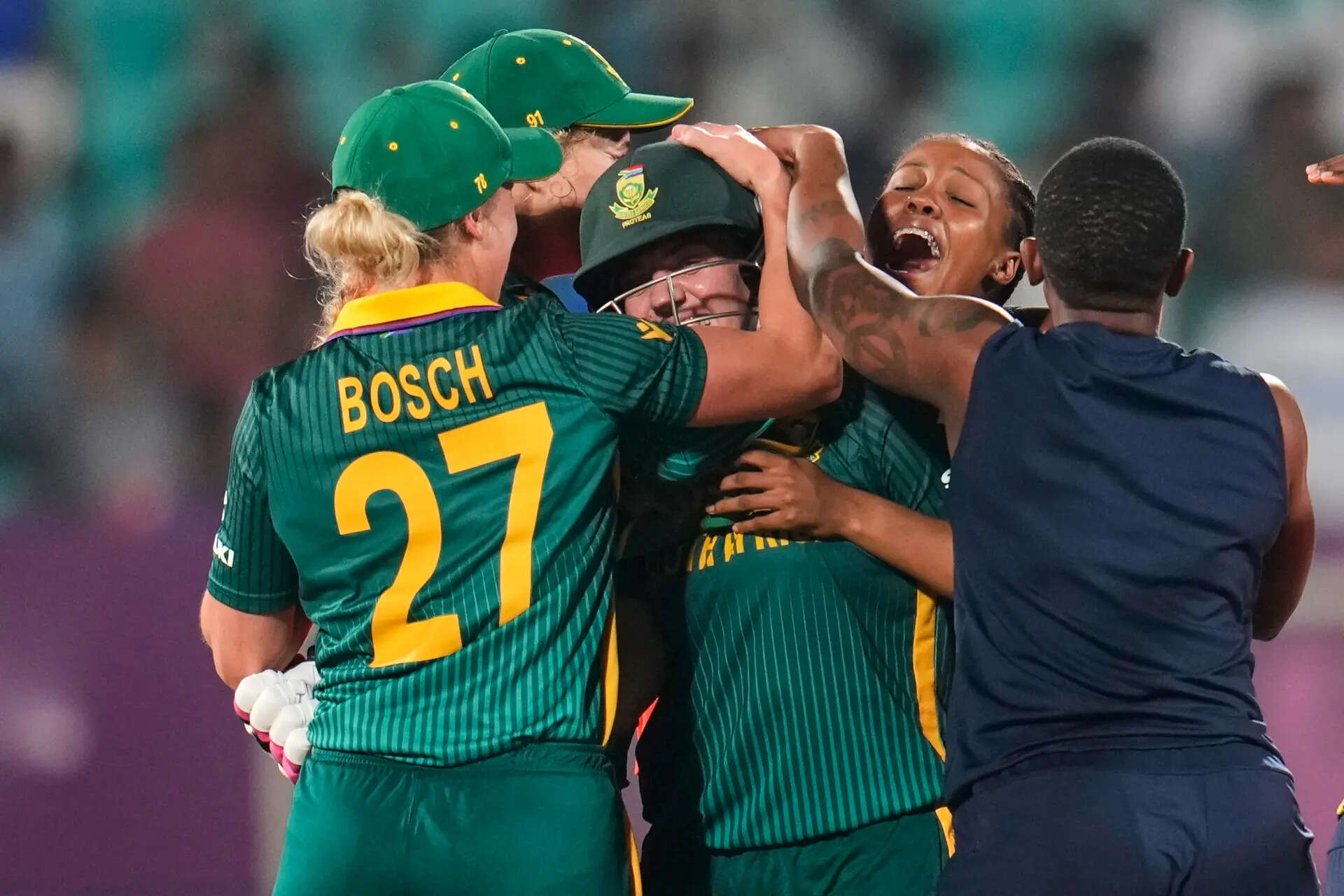 South Africa's Nadine de Klerk, center, celebrates with teammates after hitting a six to win the ICC Women's Cricket World Cup match against India at ACA-VDCA Cricket Stadium in Visakhapatnam, India, Thursday, Oct. 9, 2025. (AP Photo/Aijaz Rahi) India Women's Cricket WCup