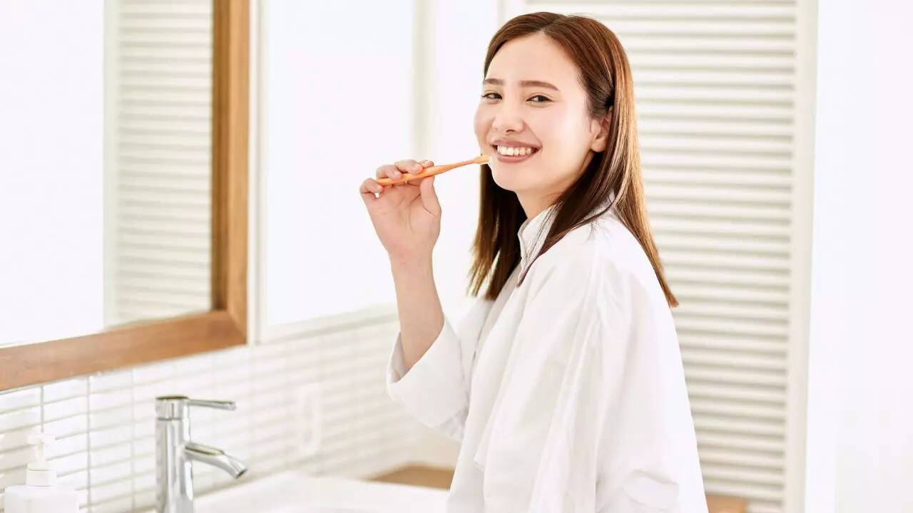 Pic courtesy: Canva brushing teeth