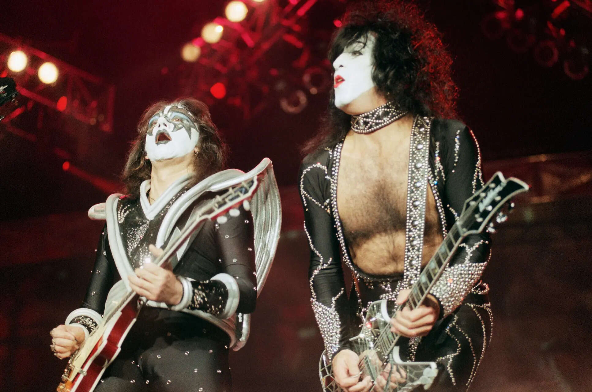 FILE - Paul Stanley, right, and Ace Frehley of the rock band Kiss perform during their sold-out Halloween concert at Dodger Stadium in Los Angeles, Saturday, Oct. 31, 1998. (AP Photo/Chris Pizzello) Ace Frehley, Kiss' original lead guitarist and founding member, dies at 74