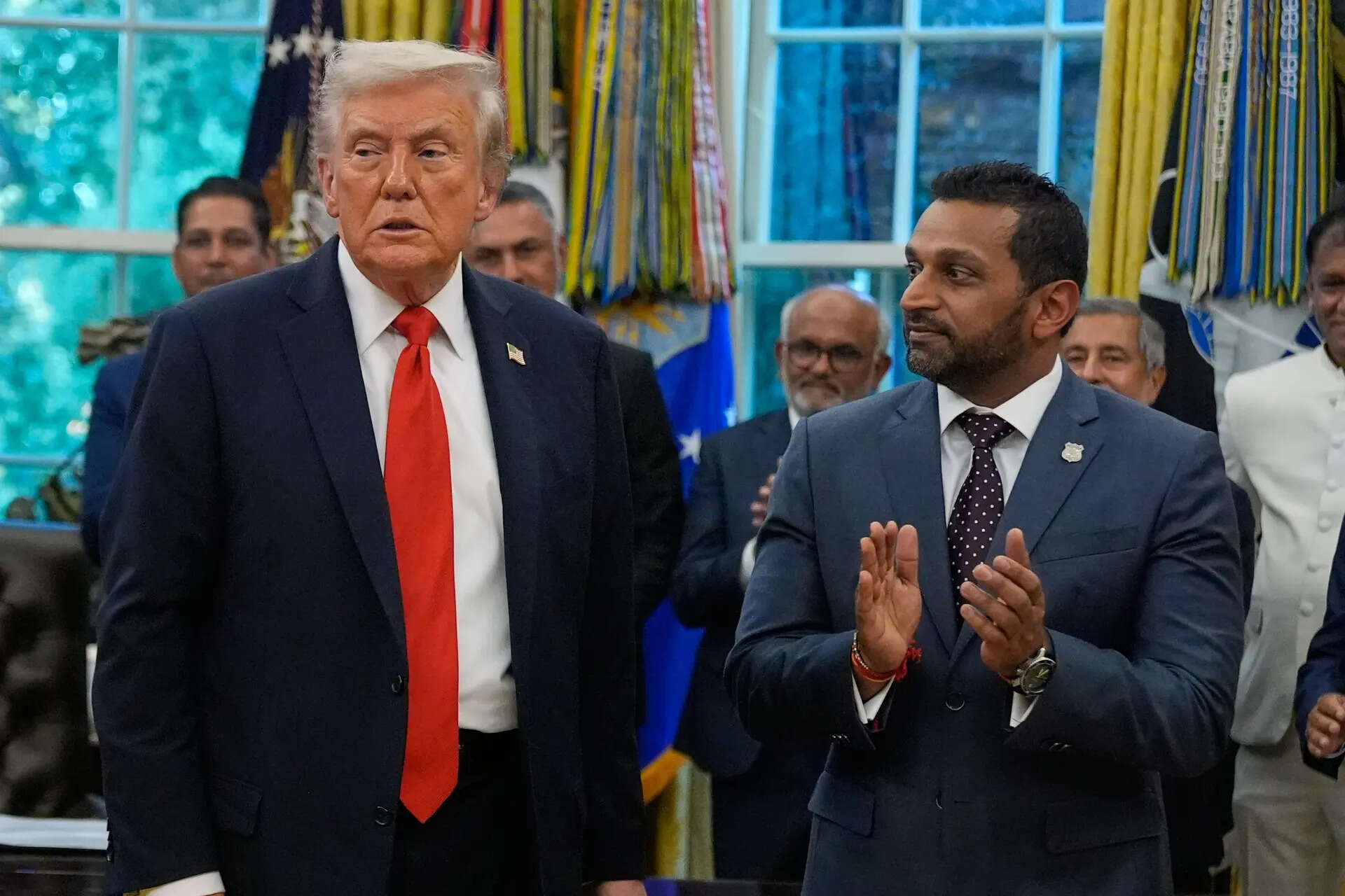 President Donald Trump stands with FBI director Kash Patel as he participates in a Diwali celebration in the Oval Office at the White House, Tuesday, Oct. 21, 2025, in Washington. (AP Photo/Manuel Balce Ceneta) Donald Trump and Kash Patel