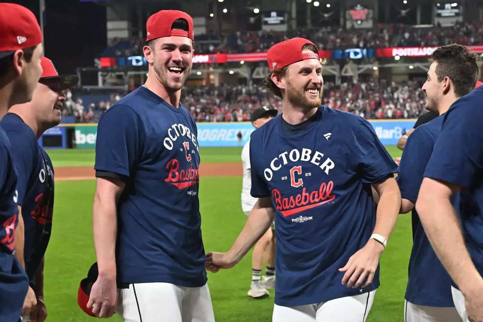 Cleveland Guardians outfielder Nolan Jones celebrates with starting pitcher Tanner Bibee (28) after the Guardians beat the Texas Rangers