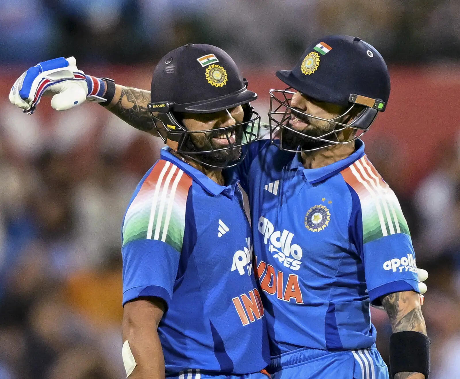 India's Rohit Sharma, left, celebrates his century with teammate Virat Kohli (PTI Photo/Izhar Khan) India vs Australia 3rd ODI