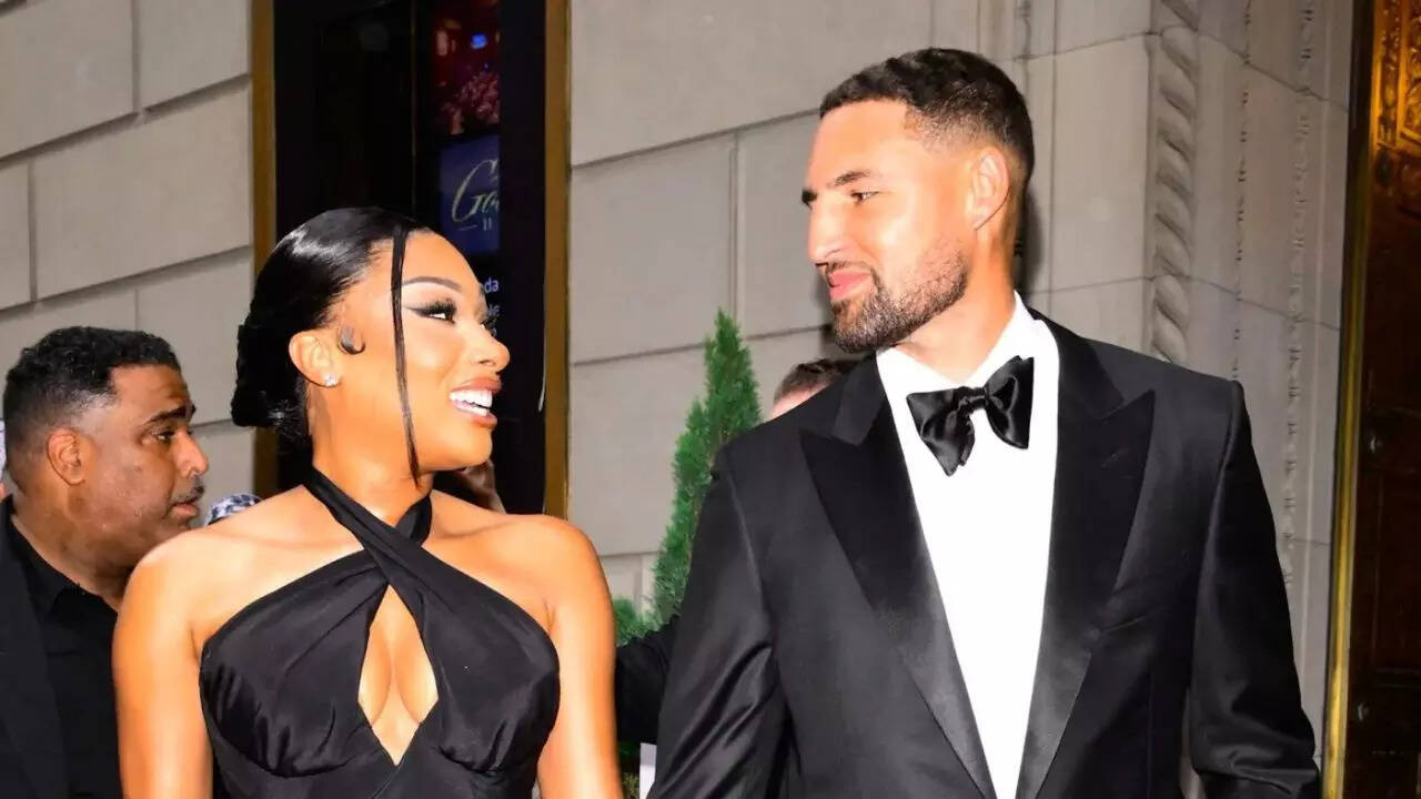 Raymond Hall/GC Images/Getty Images Megan Thee Stallion and Klay Thompson