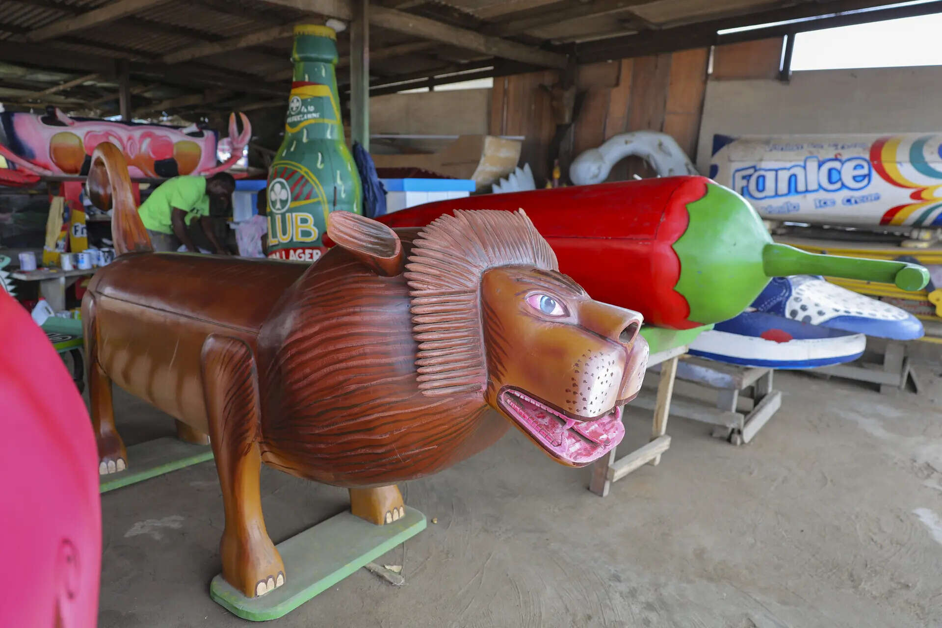 Fantasy coffins are displayed at Eric Kpakpo's carpentry shop in La, Accra, Ghana, Wednesday, July 23, 2025. (AP Photo/Misper Apawu) Photos show Ghana's fantasy coffins as a stylish final rest