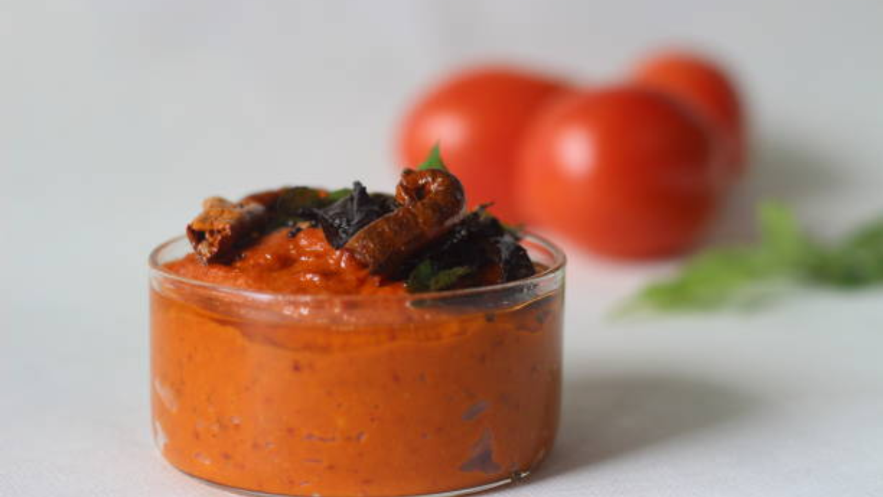Onions (red onions work best for sweetness), red chilies, tamarind, garlic (optional but recommended), salt, oilHeat oil, sauté onions until caramelized, add red chilies and tamarind, and cook down. Blend into a paste. No need for tempering—it’s bold enough on its own. Onion chutney